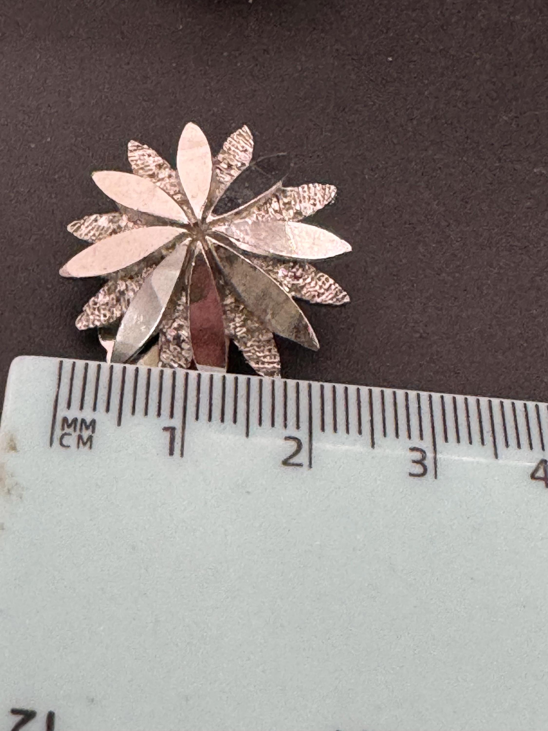 1970s brutalist star clip on earrings, silver tone