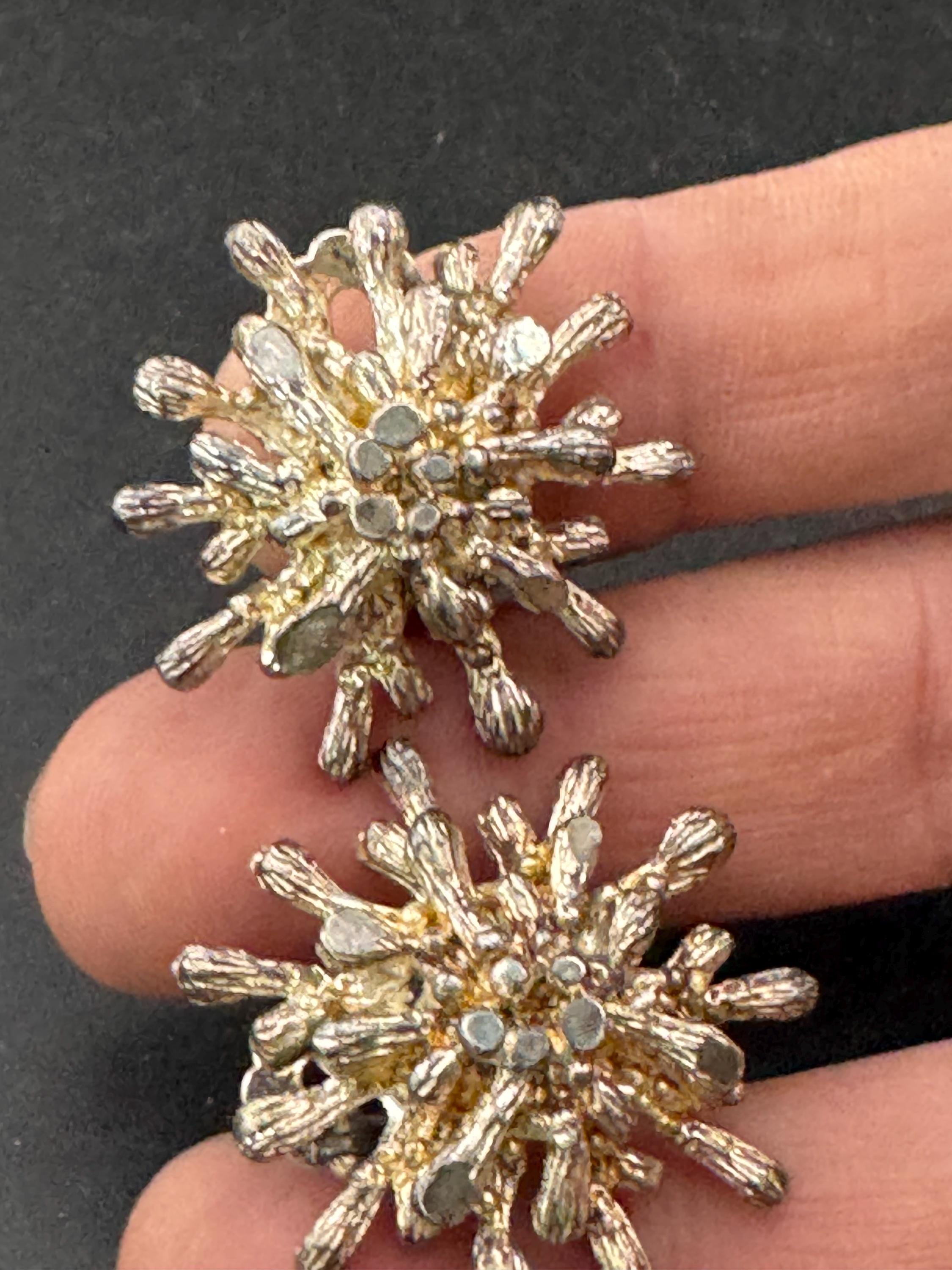 1970s brutalist spikey star clip on earrings, silver tone