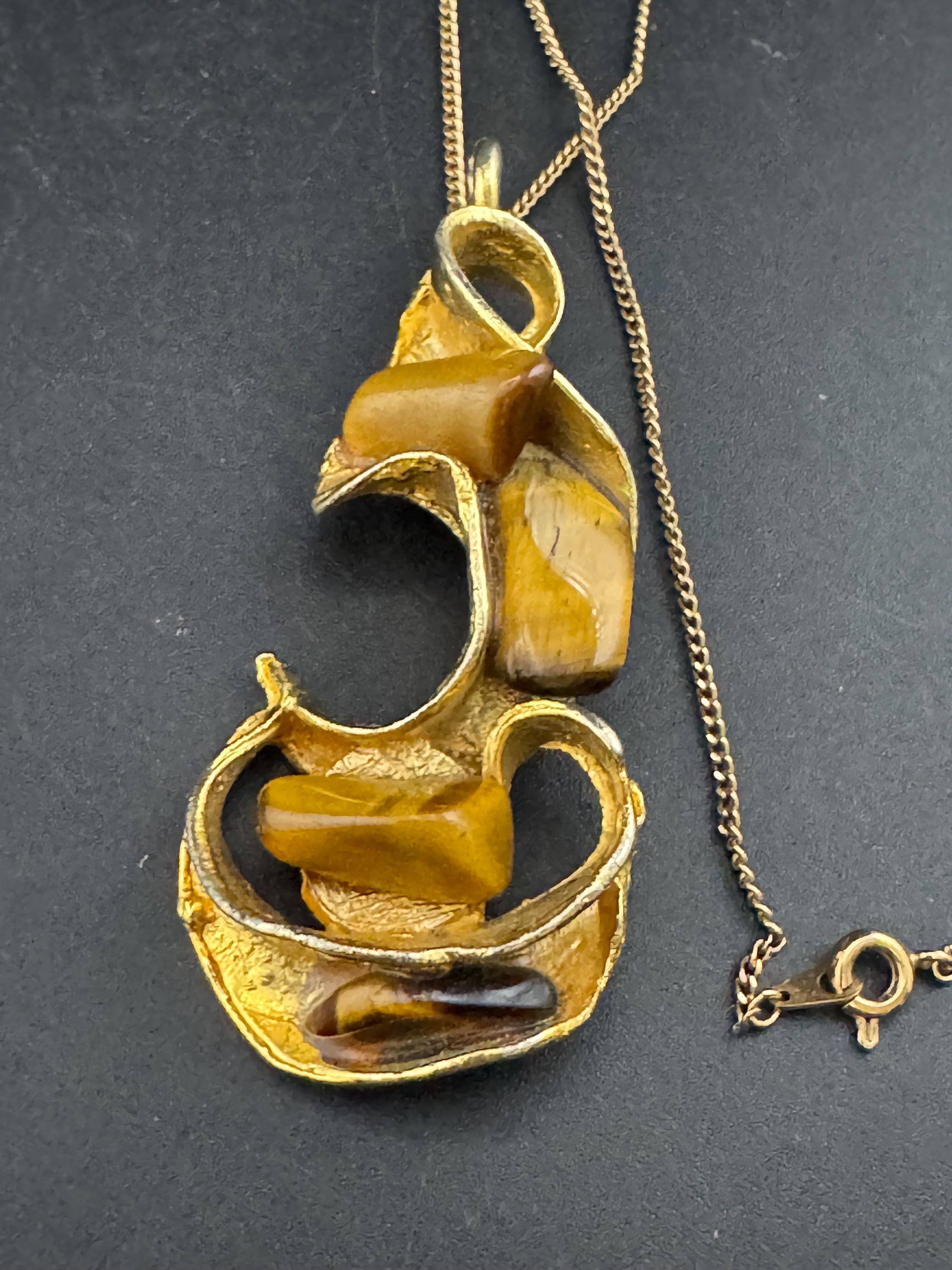 Gold tone 1970s Brutalist brown tigerseye gemstone combination pendant necklace and brooch