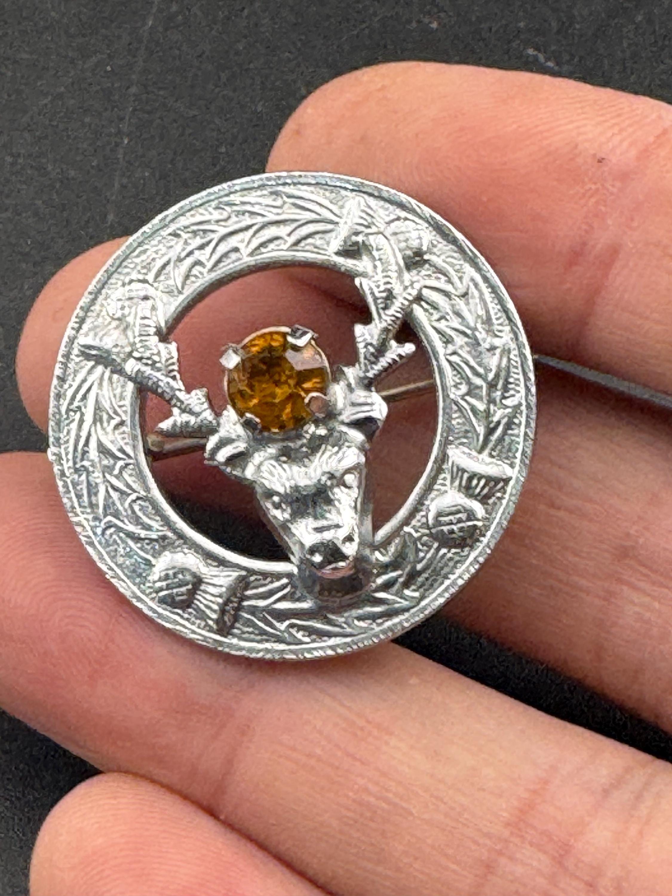 Vintage Scottish citrine glass Thistle and stag Brooch, silver tone