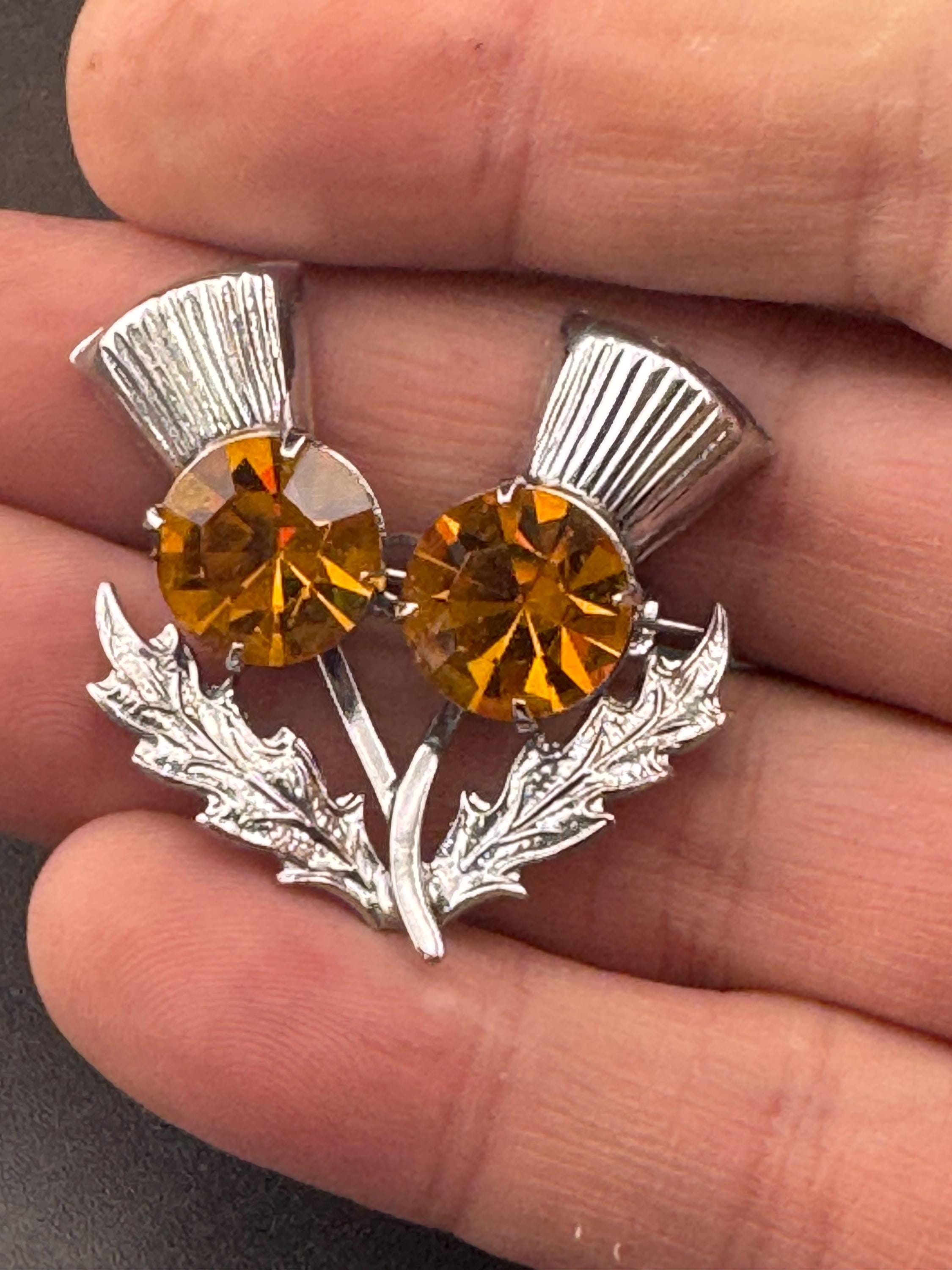 Vintage Scottish thistle brooch set with faux glass citrine, silver chrome metal