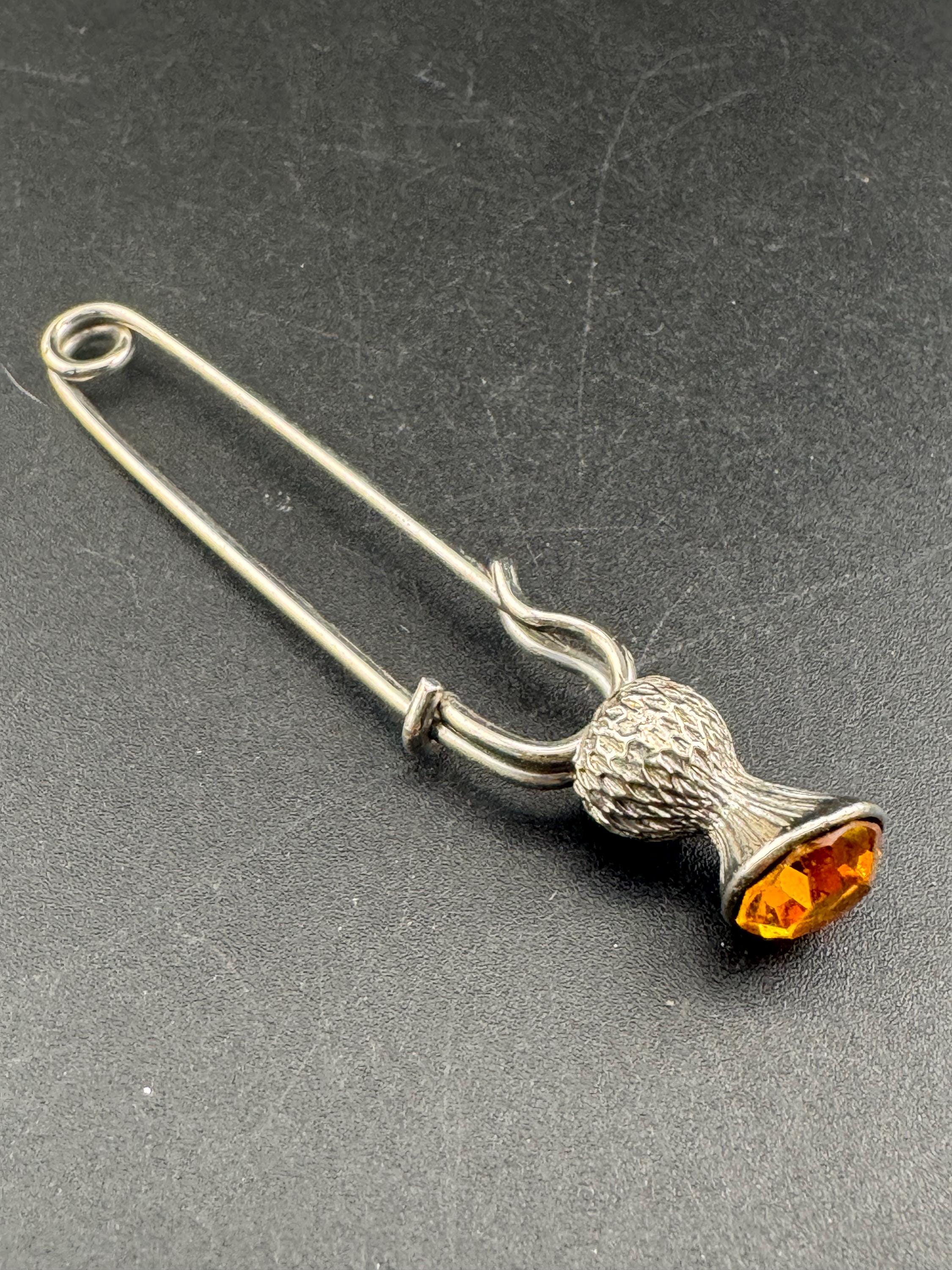Vintage Scottish thistle brooch set with faux glass citrine, silver tone