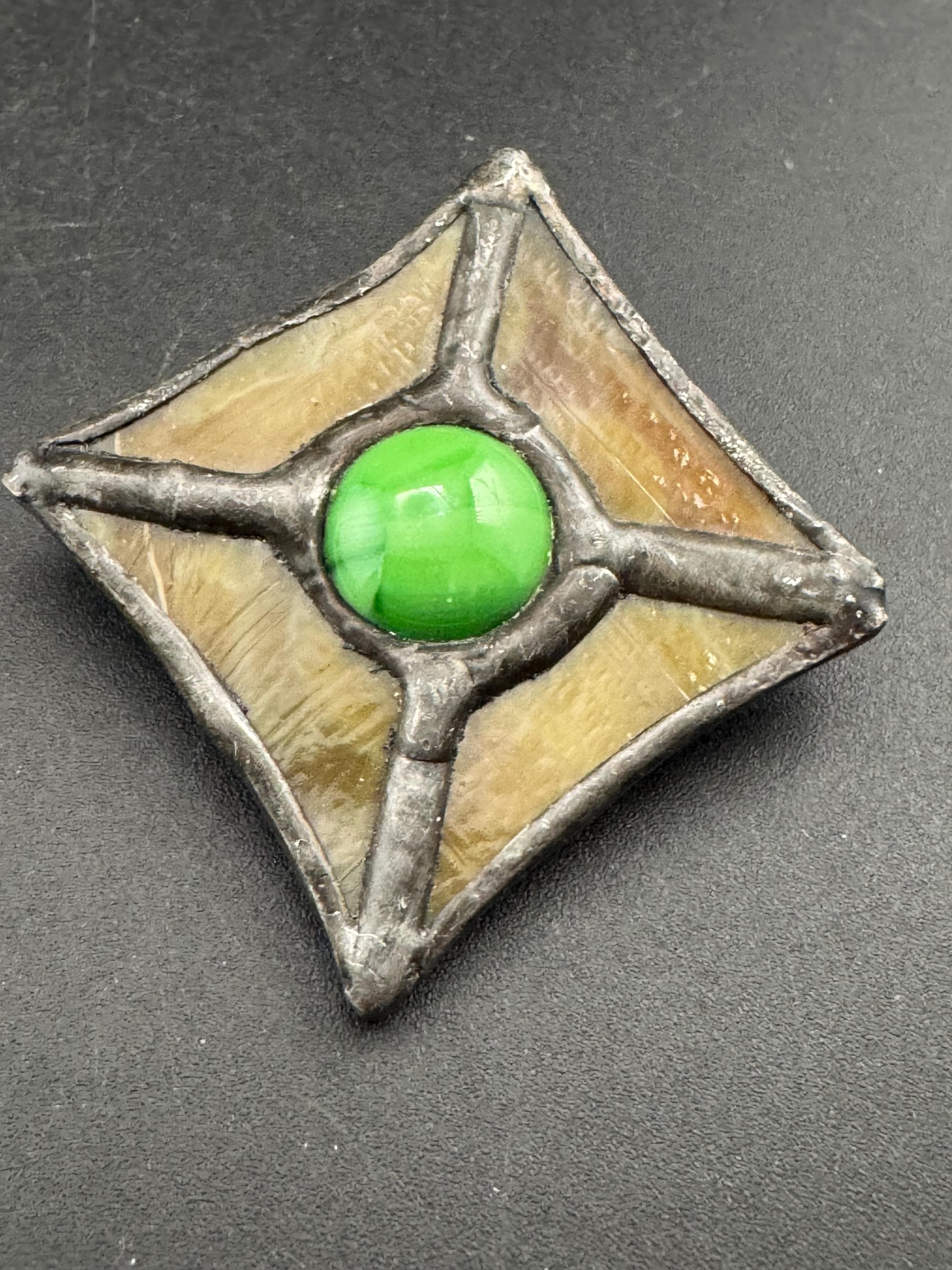Vintage arts and crafts style pewter glass brooch, green cabochon Ruskin style