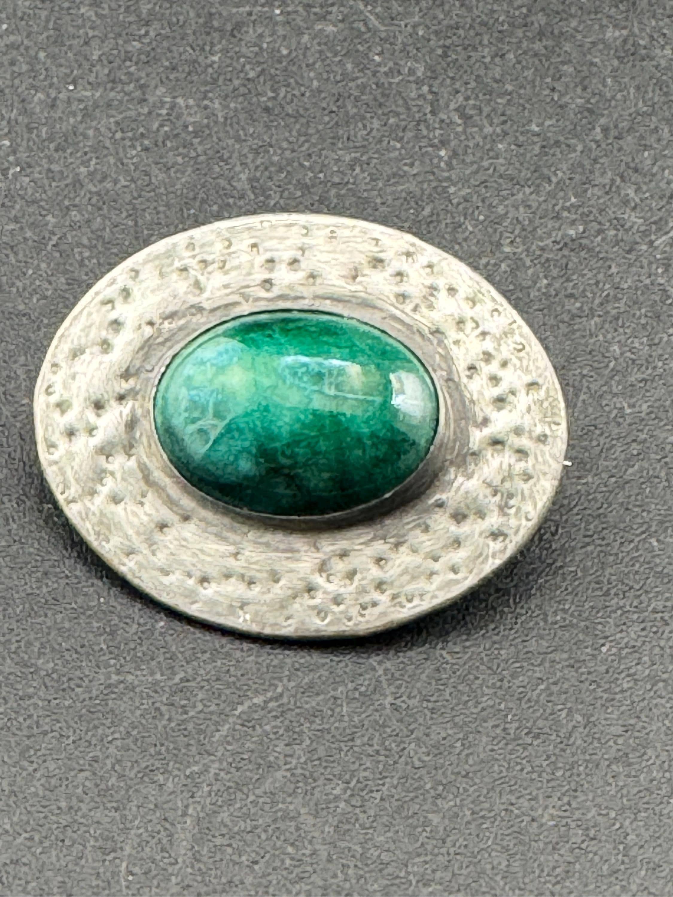 Vintage arts and crafts pewter brooch, green cabochon Ruskin style