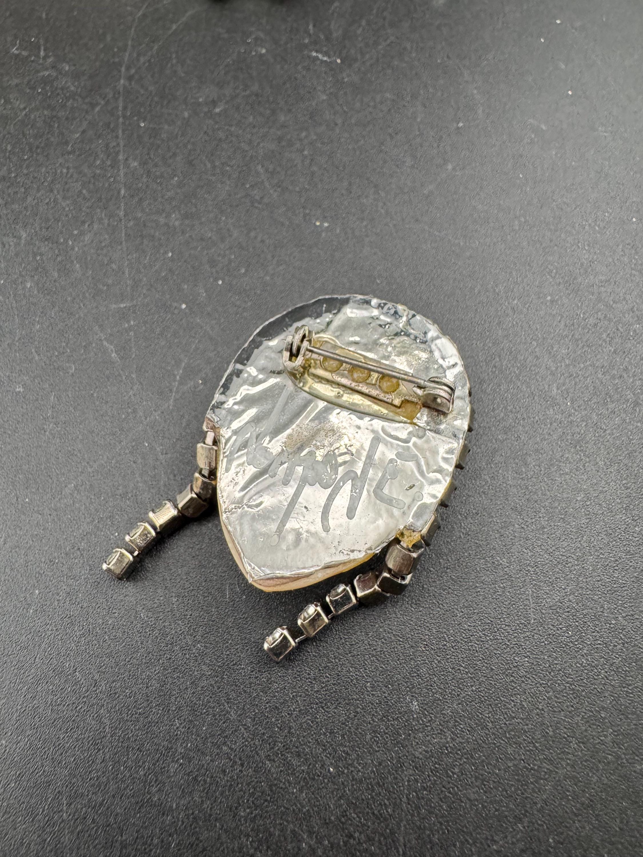 Signed vintage rhinestone flapper face brooch, art deco lady pin