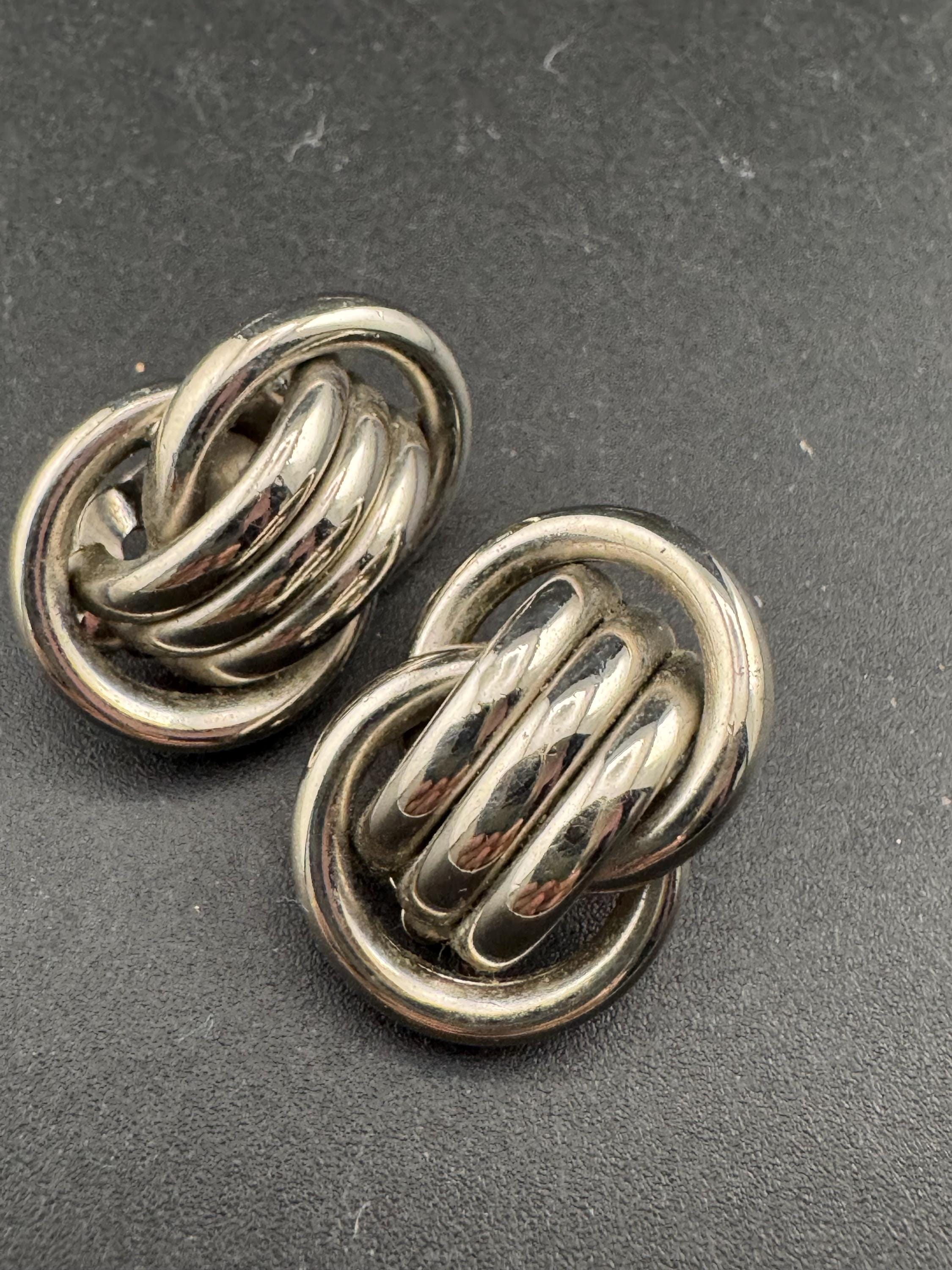1980s vintage metal tube knot clip on earrings, silver tone