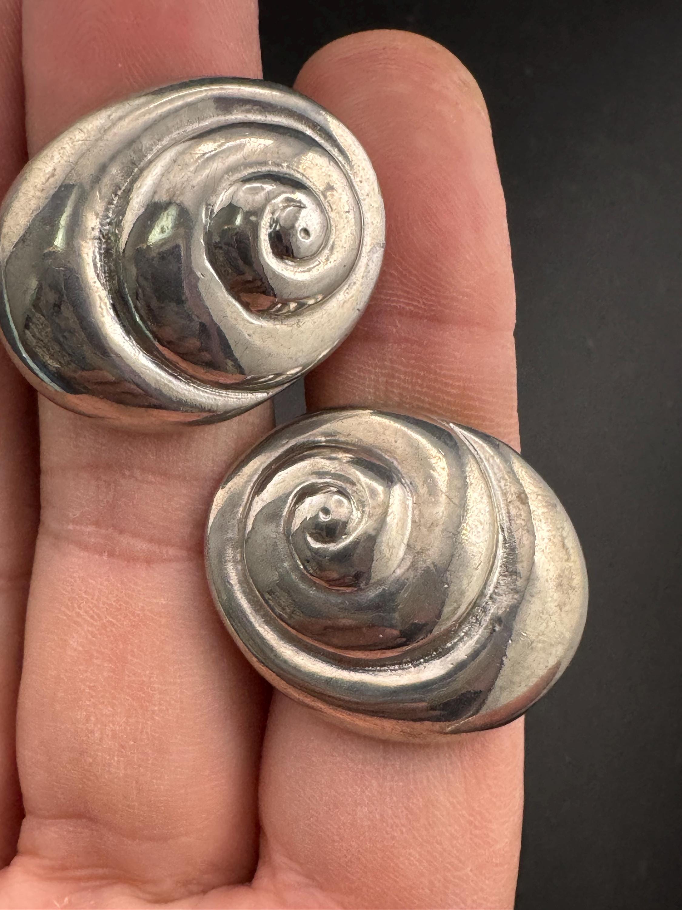 Vintage swirl seashell clip on earrings, silver tone metal studs