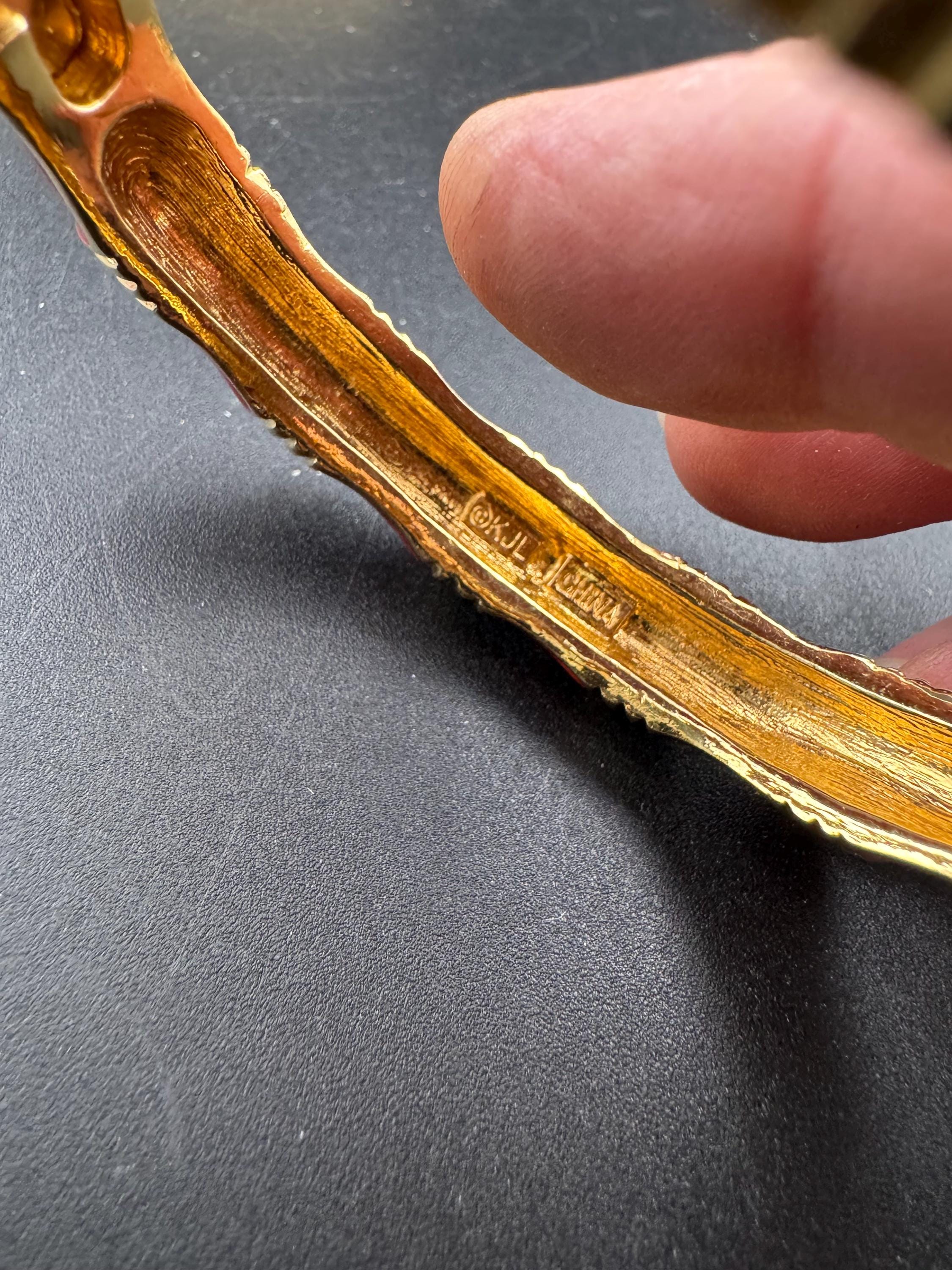 Signed KJL Red enamel gold tone bamboo clamper bangle bracelet Kenneth j lane
