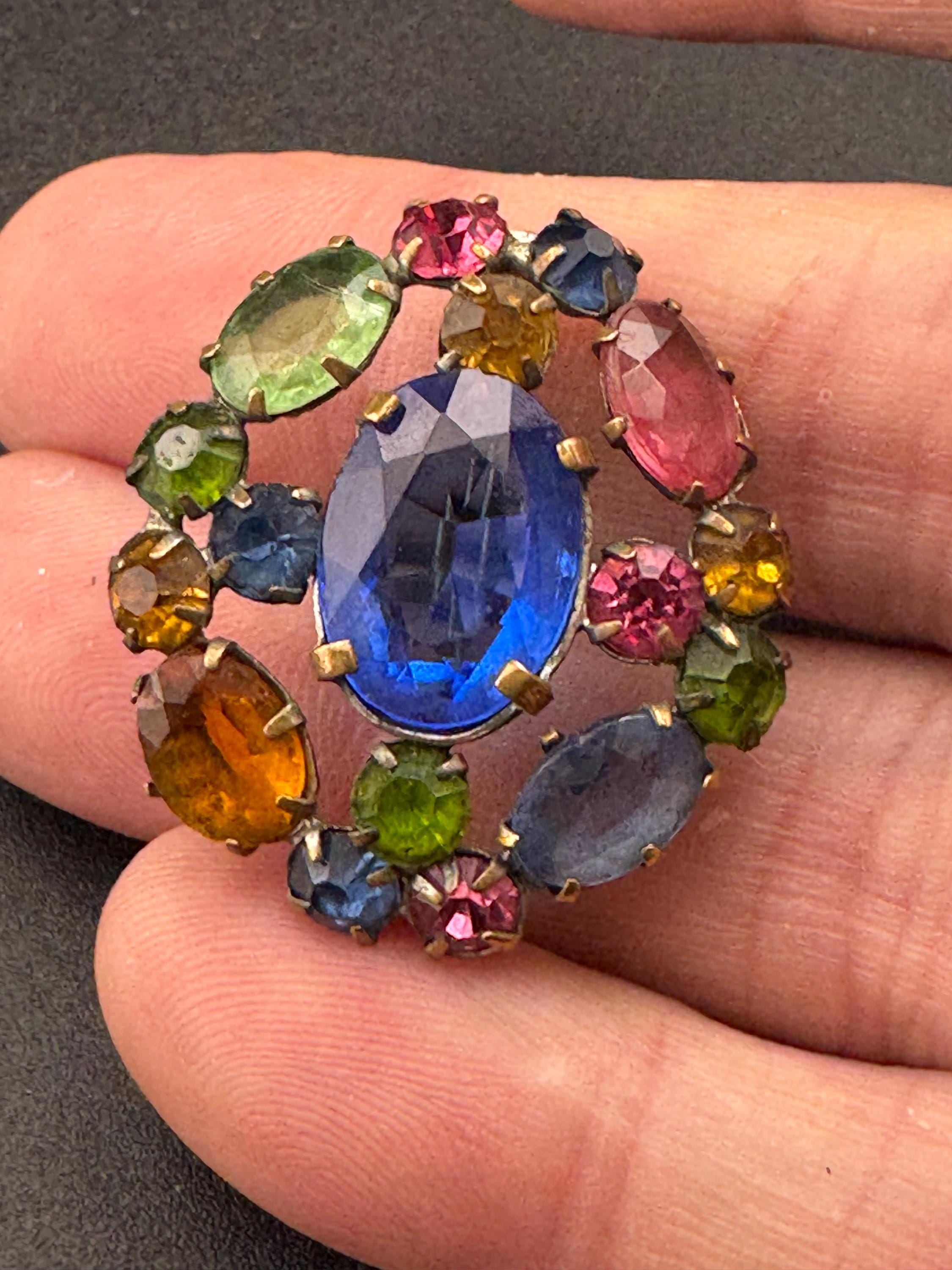 Antique Edwardian gold tone rainbow diamanté crystal oval open back brooch