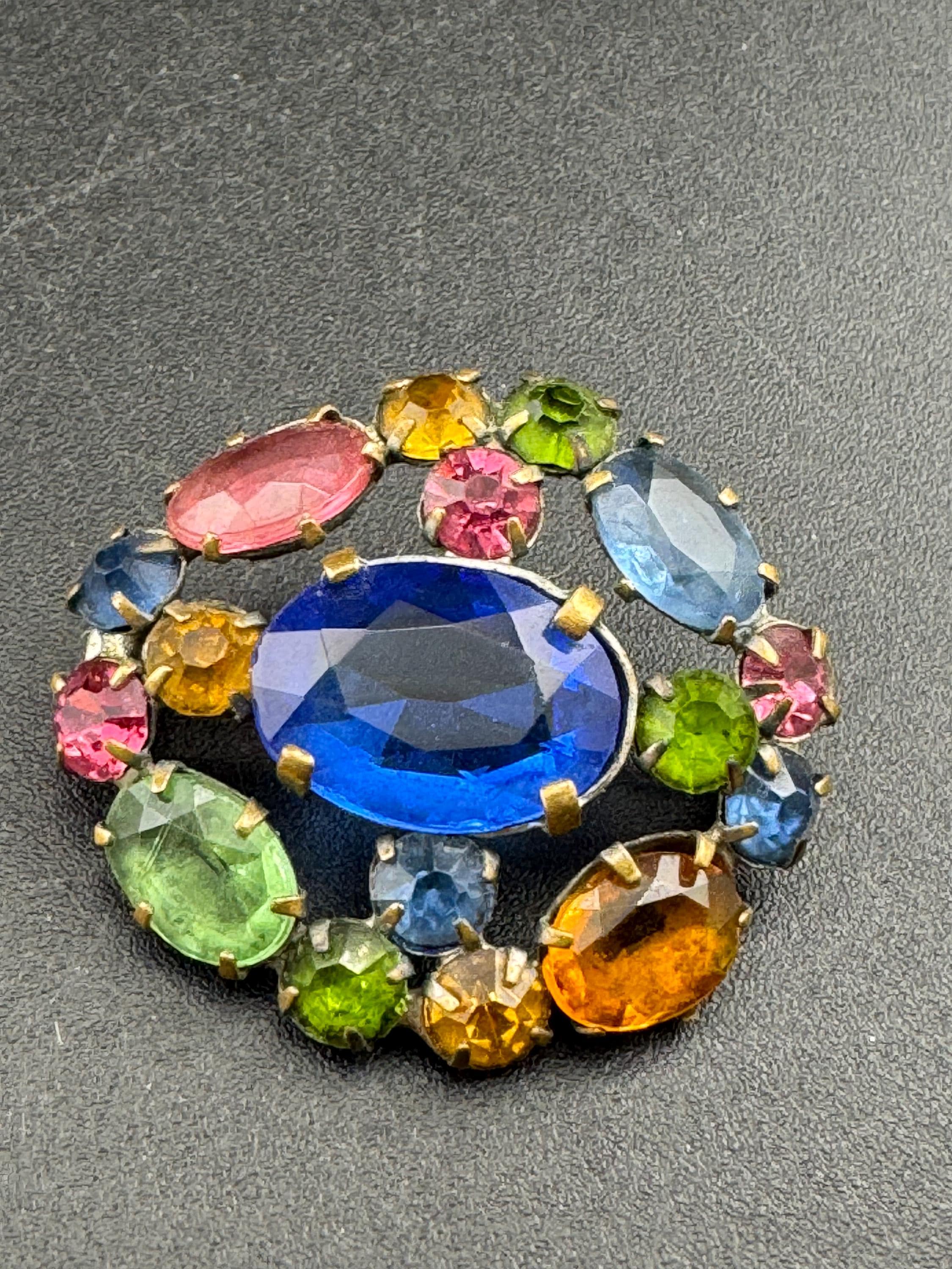 Antique Edwardian gold tone rainbow diamanté crystal oval open back brooch