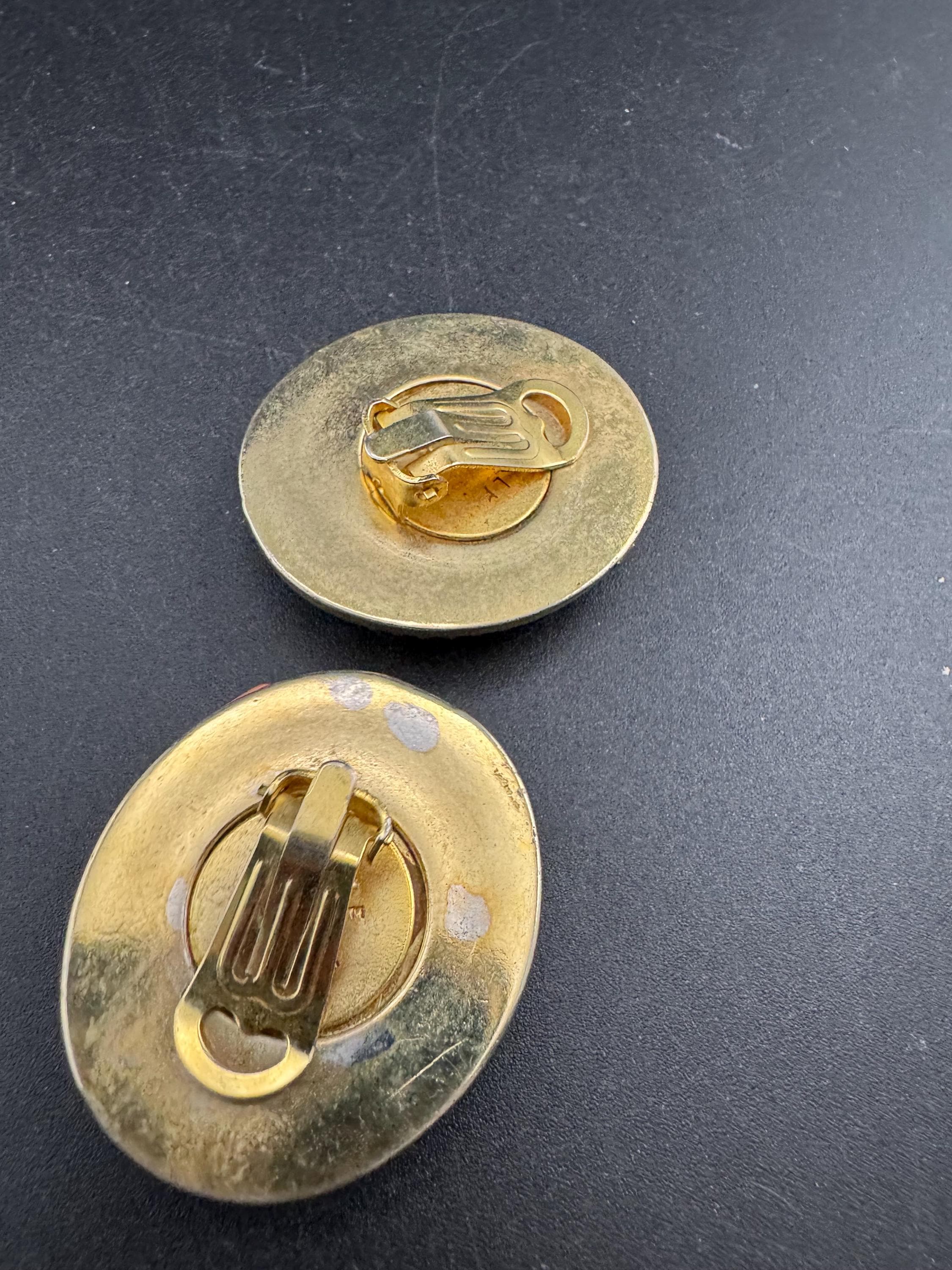 oversized oval gold tone plastic and metal clip on earrings