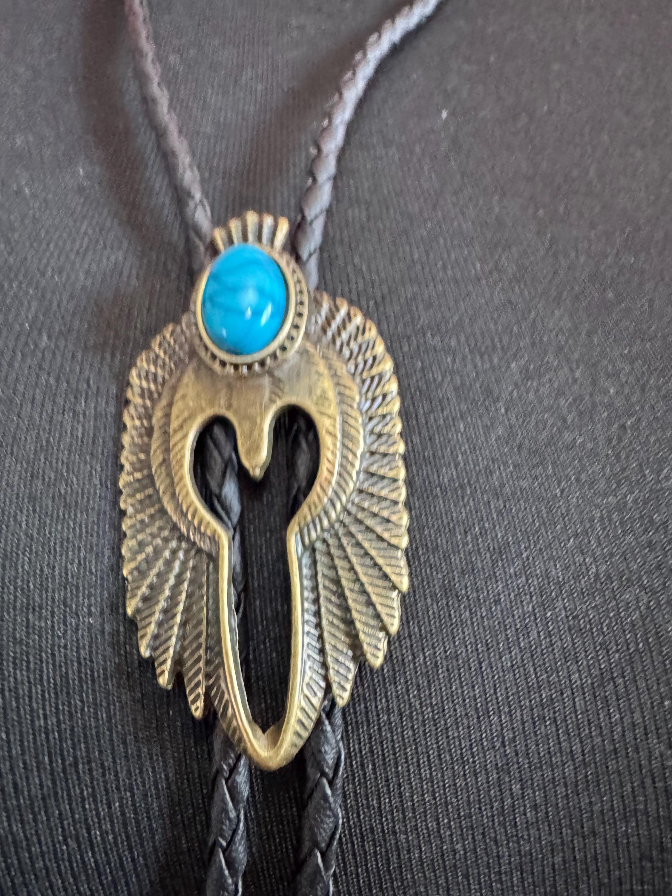 Retro gold tone south western style bolo necklace with turquoise stone on a  leather cord