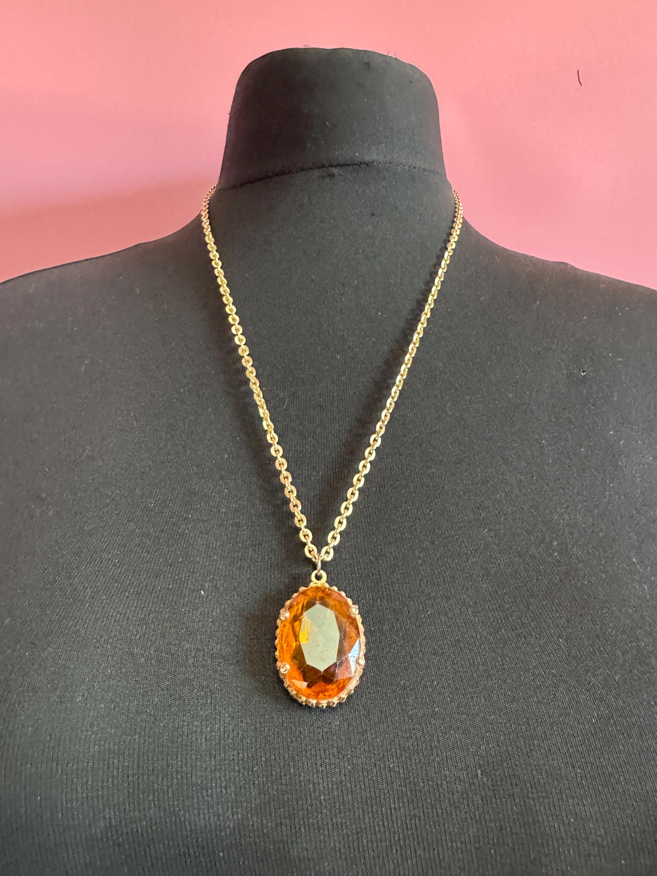 Vintage gold tone orange amber faceted Glass oval pendant necklace on 64cm chain