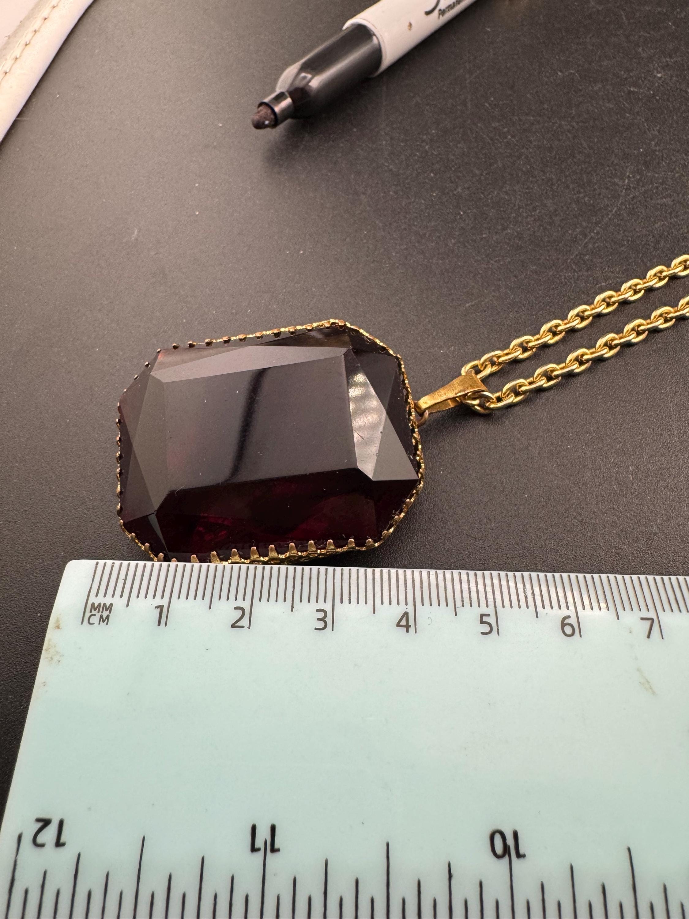 Modernist brutalist chunky gold tone ruby red glass pendant necklace on a 82cm chain