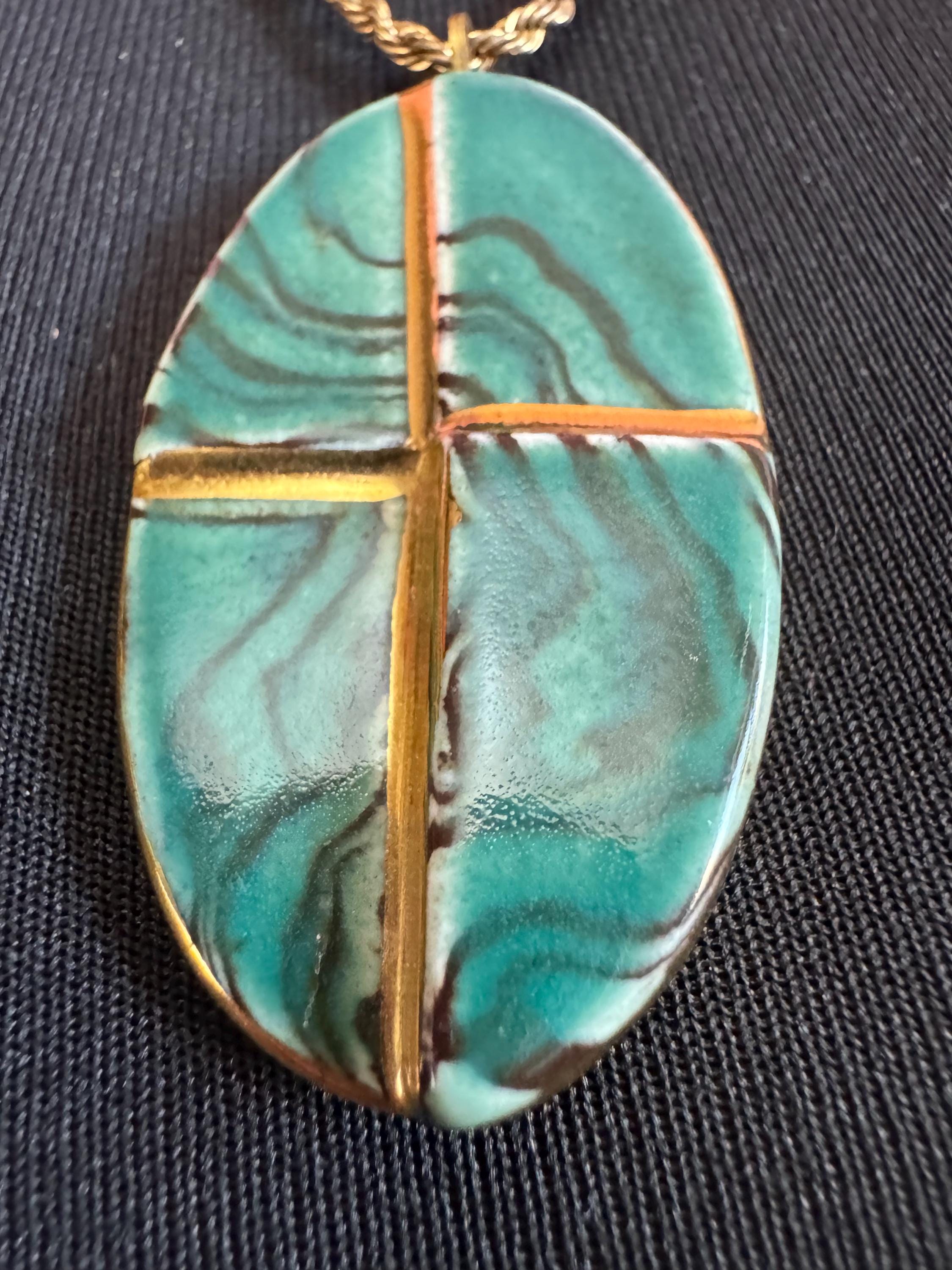 Vintage 1970s green and gold enamel pottery pendant necklace
