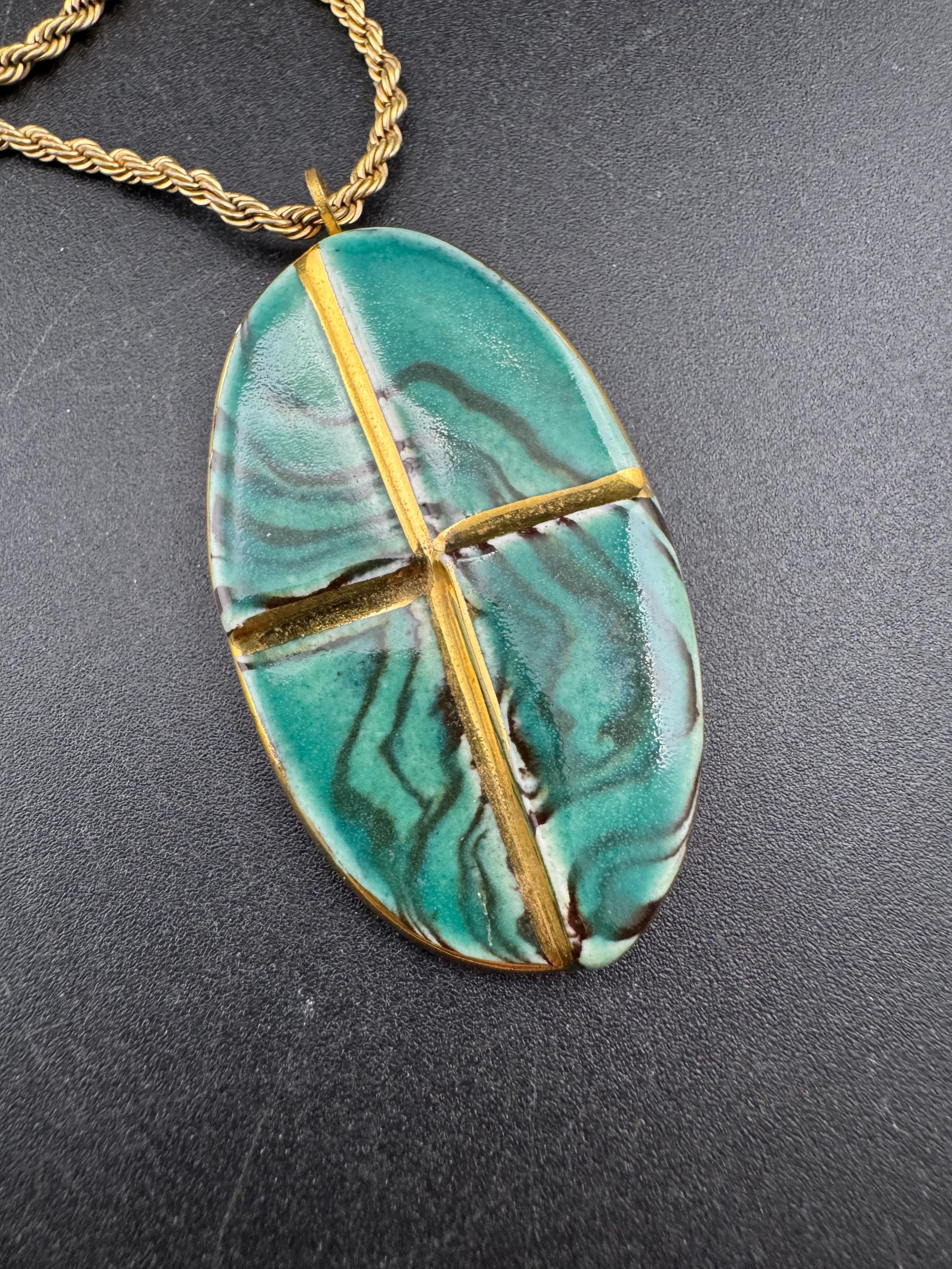 Vintage 1970s green and gold enamel pottery pendant necklace