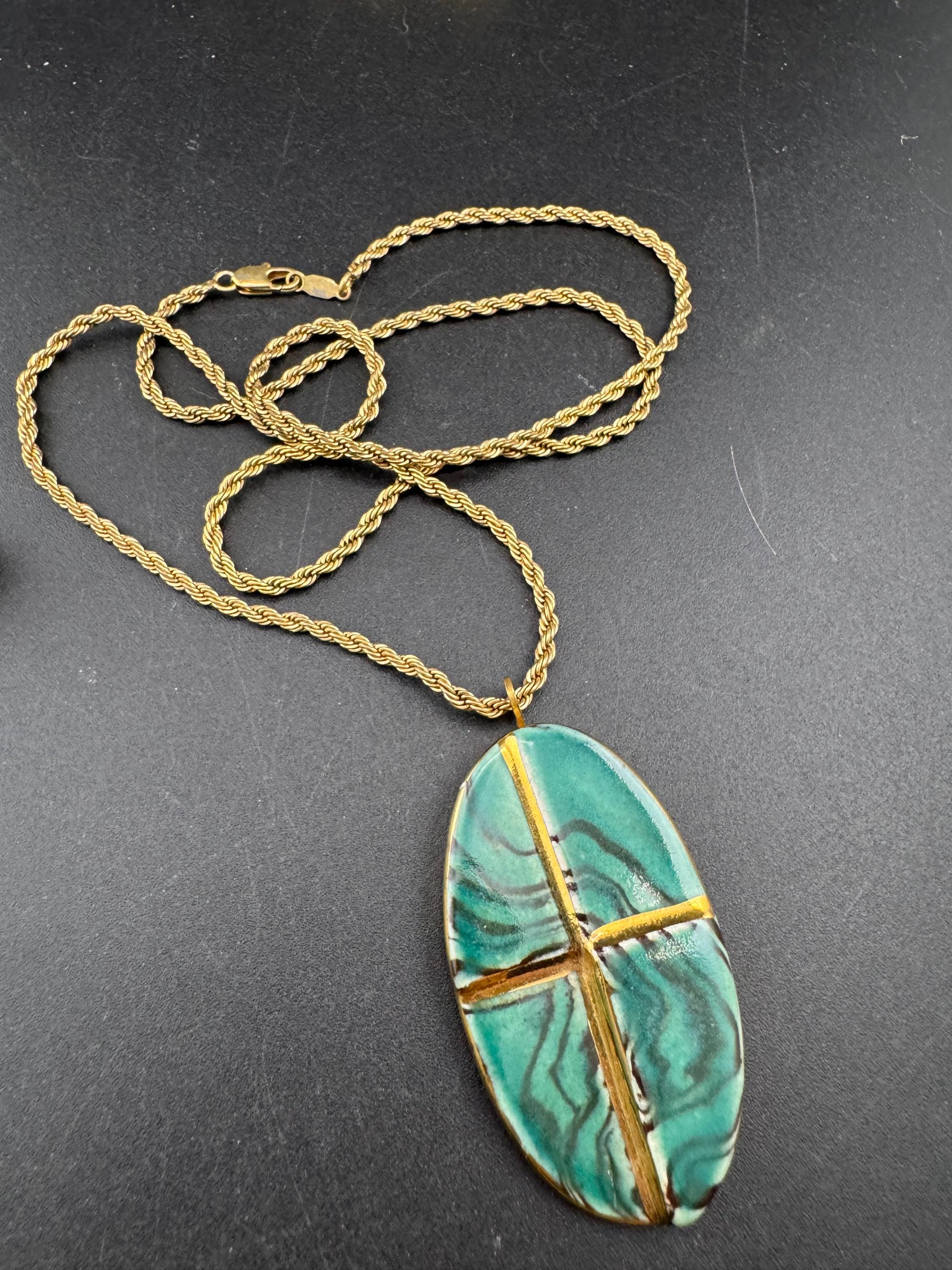 Vintage 1970s green and gold enamel pottery pendant necklace