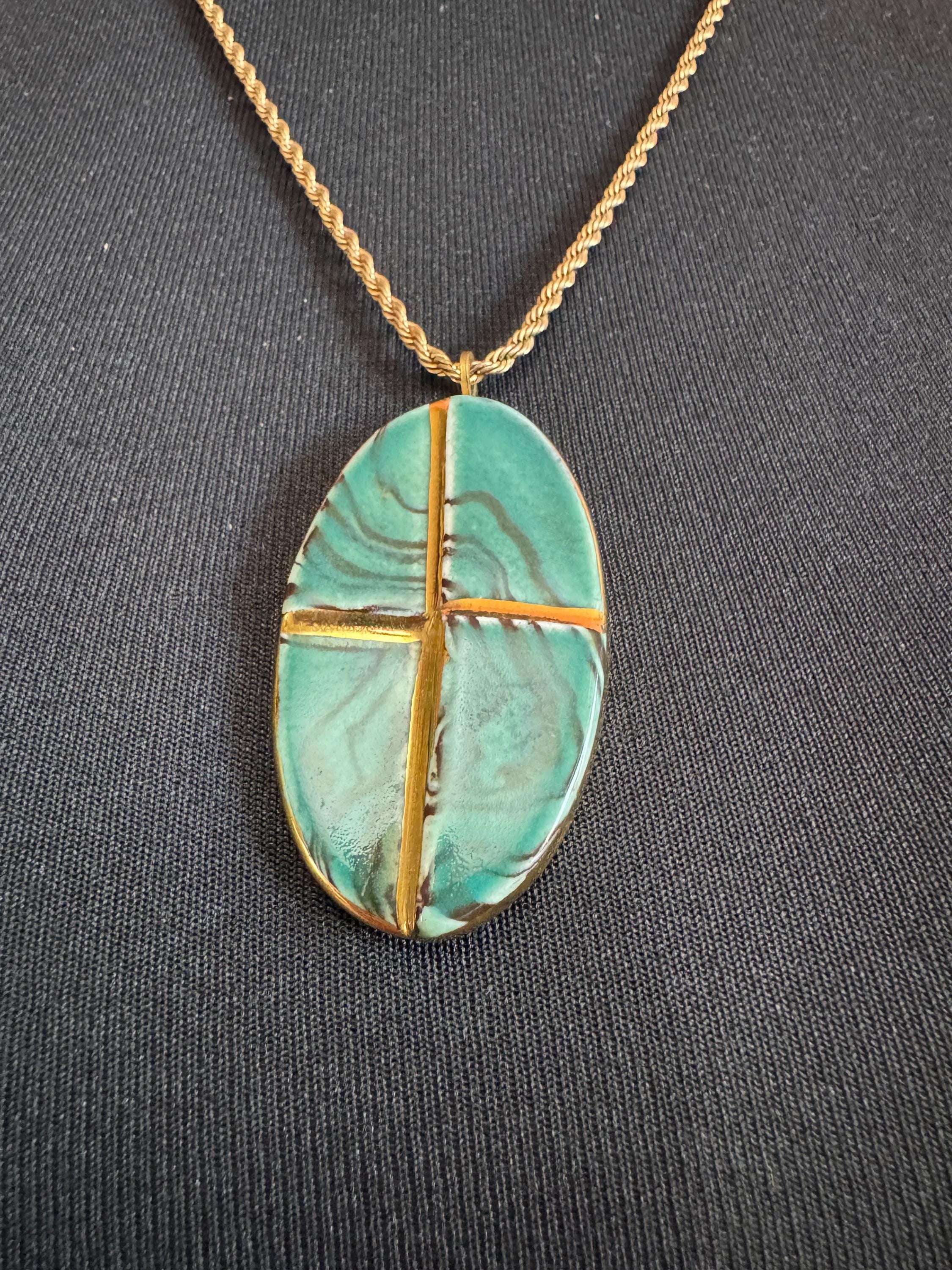 Vintage 1970s green and gold enamel pottery pendant necklace