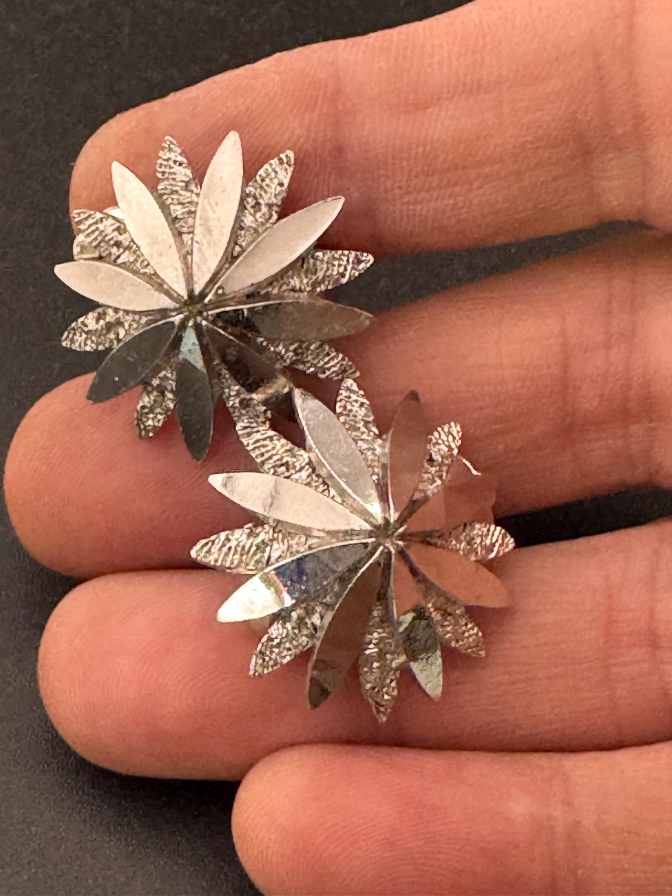 1970s brutalist star clip on earrings, silver tone