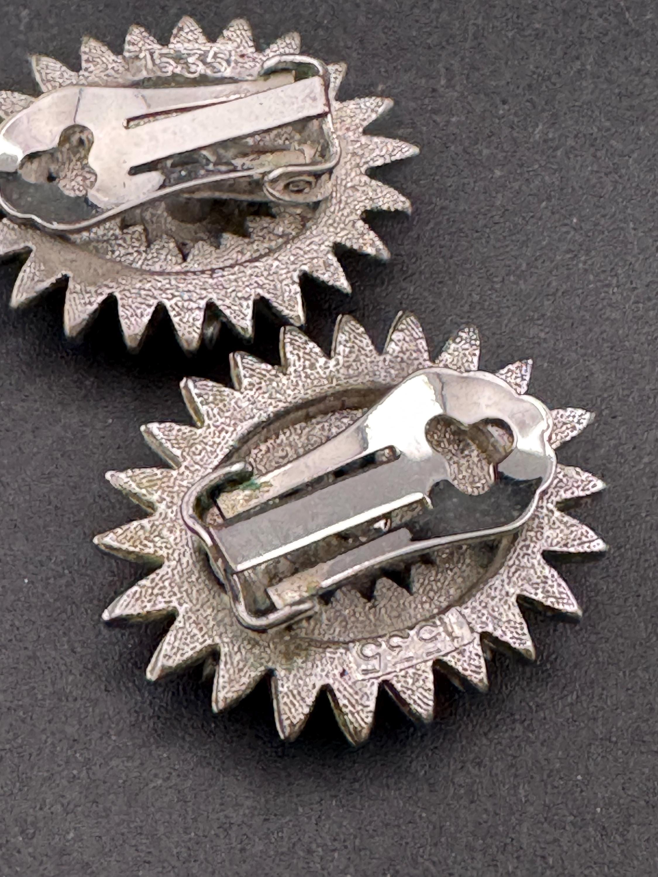 1970s brutalist star clip on earrings, silver tone