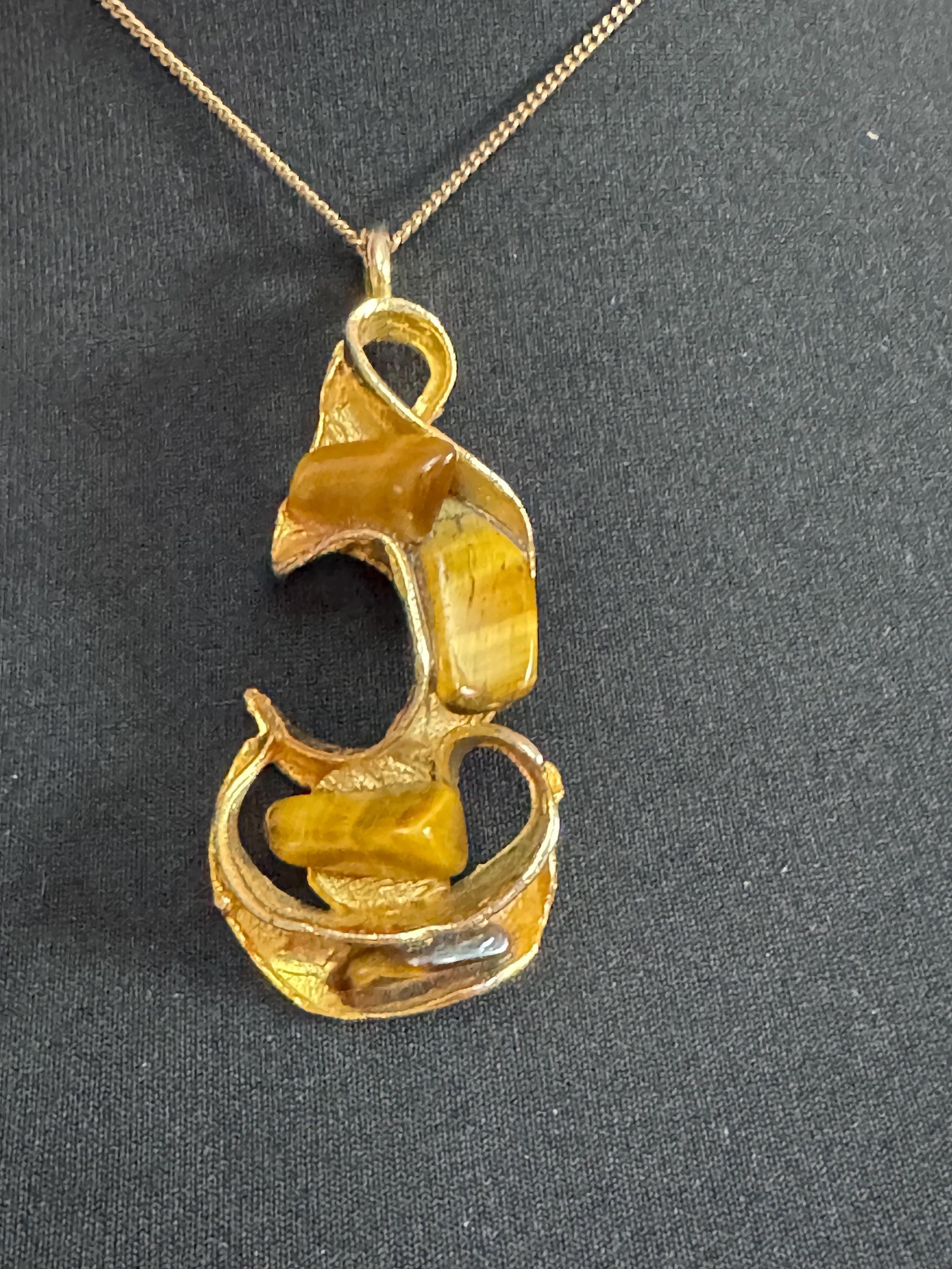 Gold tone 1970s Brutalist brown tigerseye gemstone combination pendant necklace and brooch