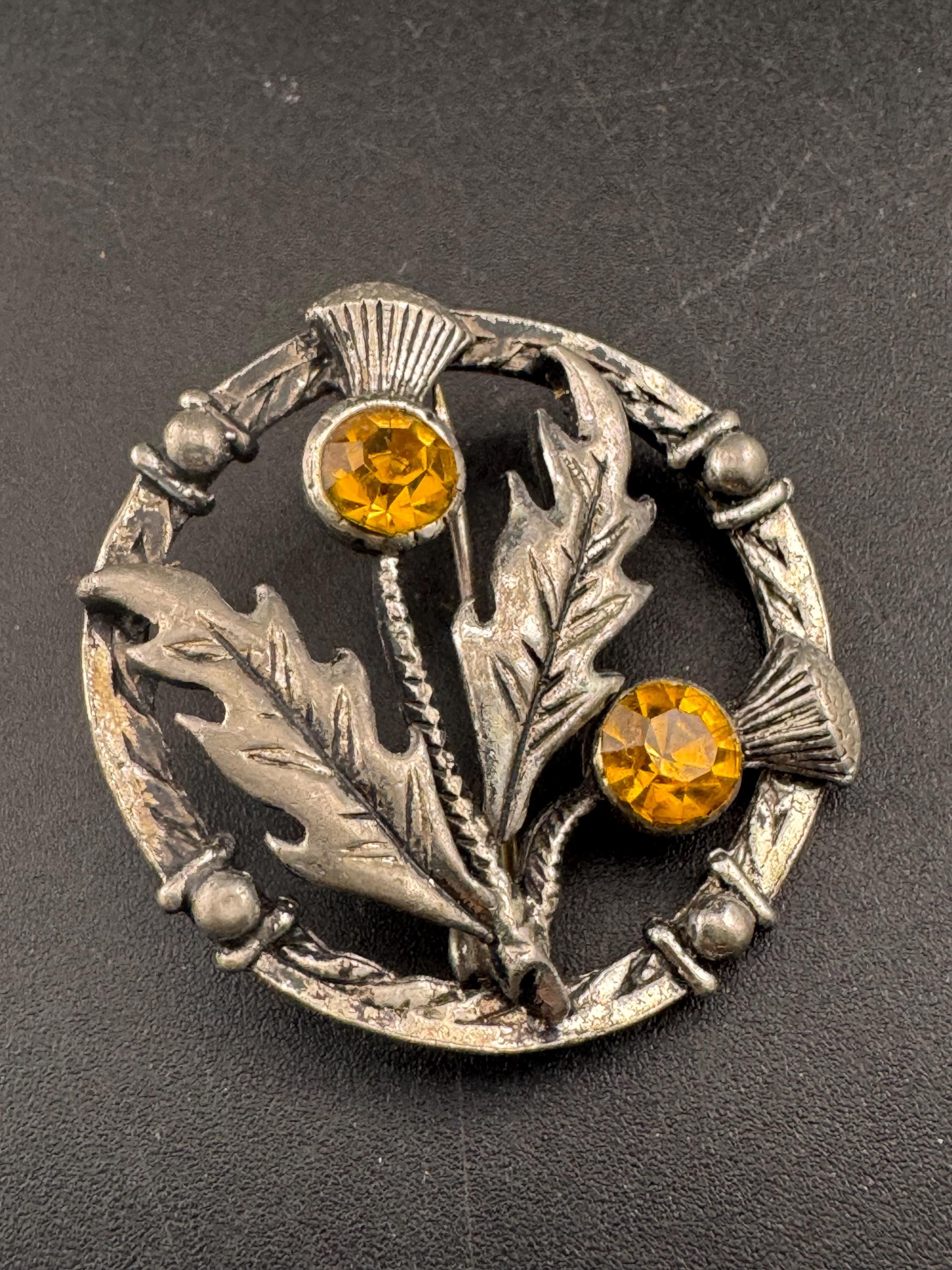 Vintage Scottish thistle brooch set with faux glass citrine, silver tone