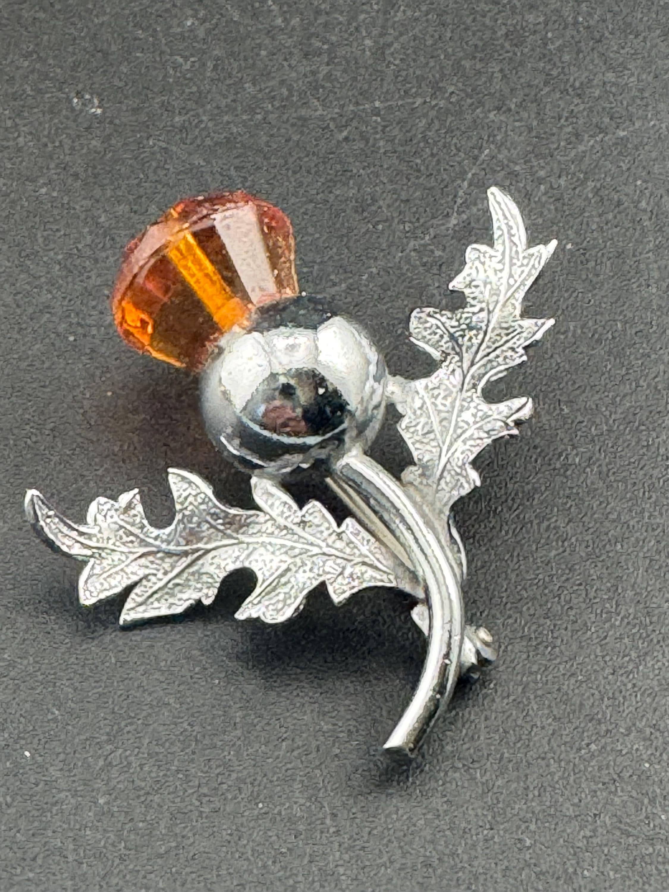 Vintage Scottish thistle brooch set with cut glass citrine flower , silver plated