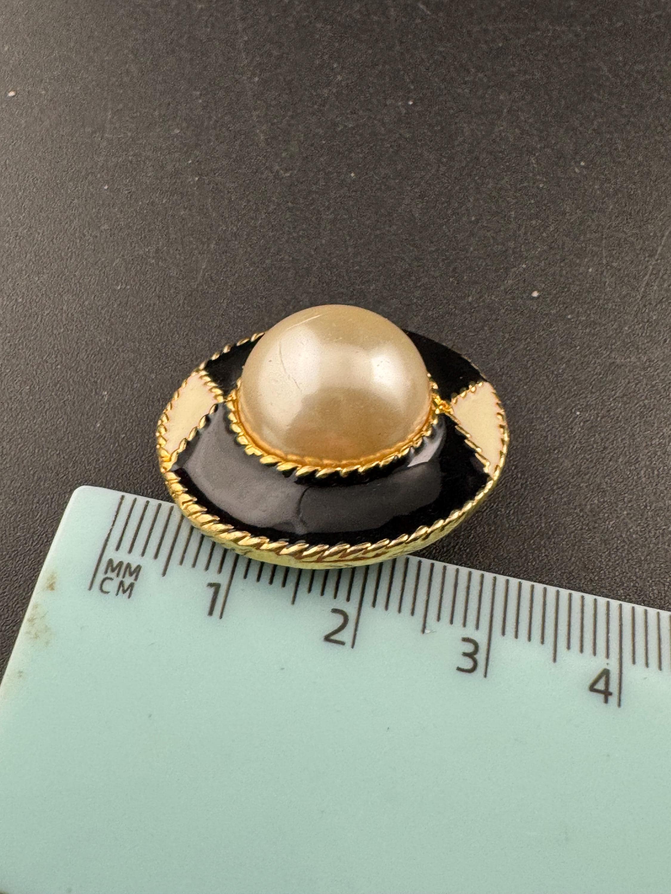 Vintage black and cream enamel and pearl oval clip on earrings , gold tone