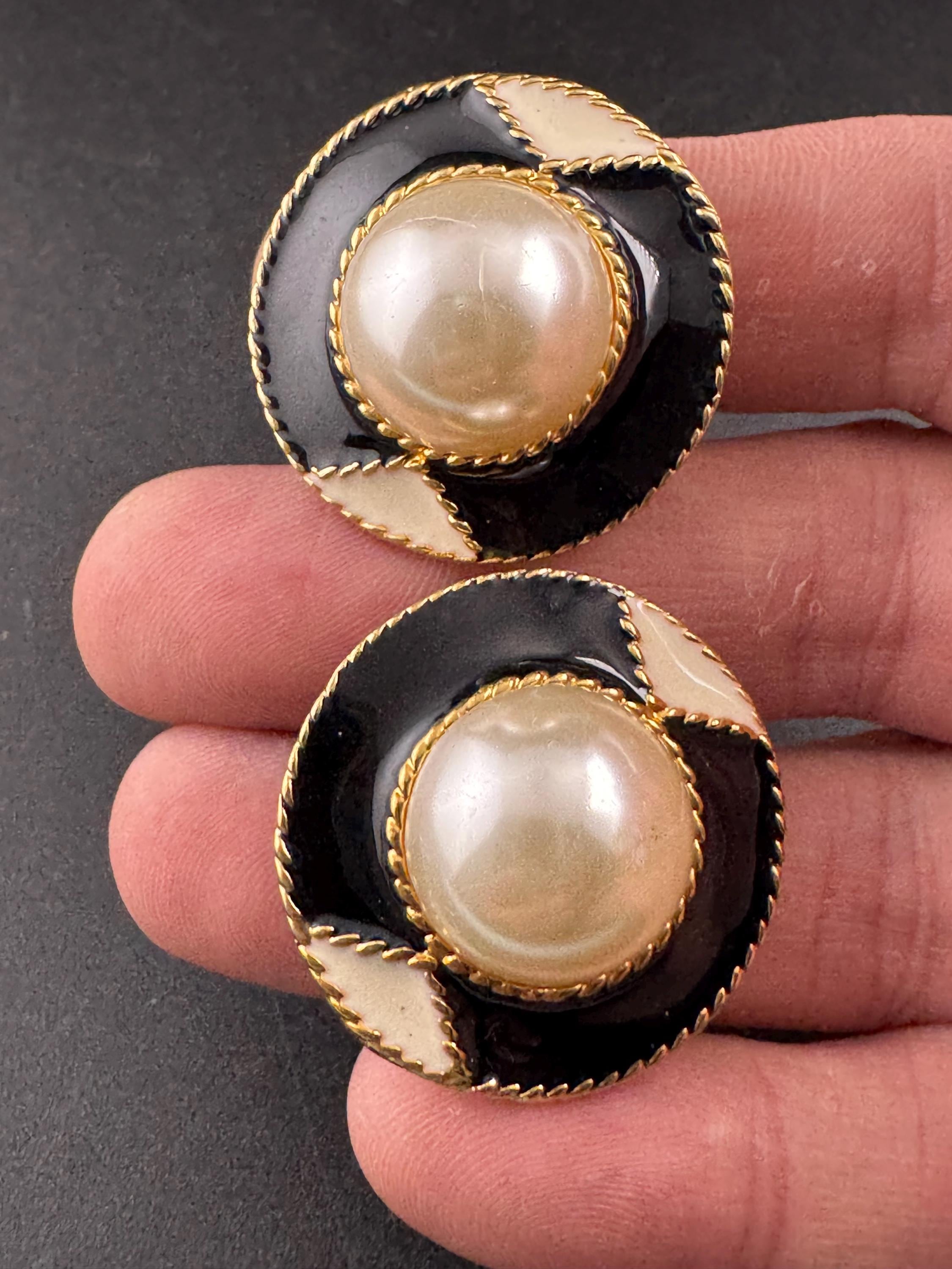 Vintage black and cream enamel and pearl oval clip on earrings , gold tone