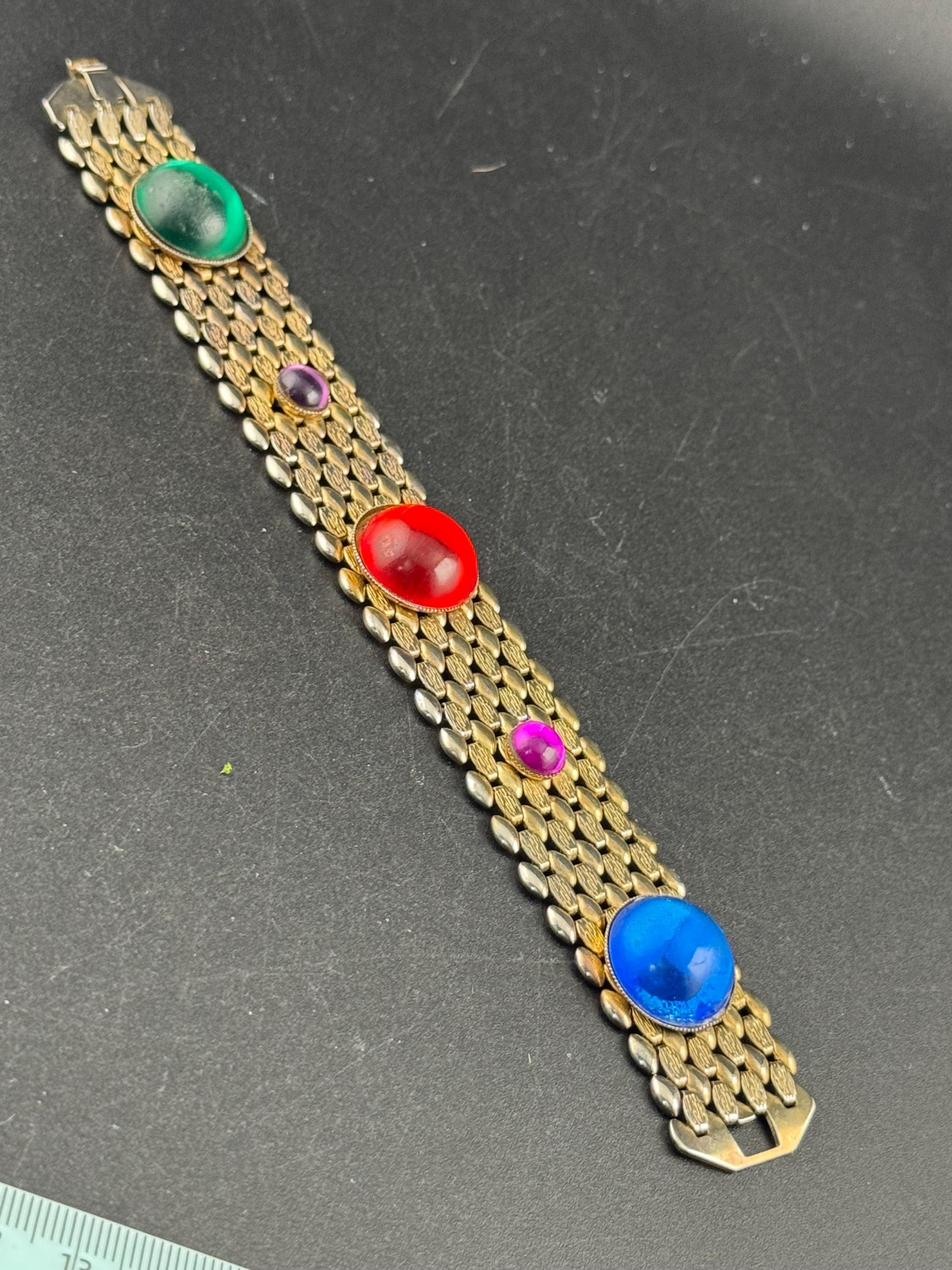 Red green blue purple cabochon gold tone wide panther link chain bracelet
