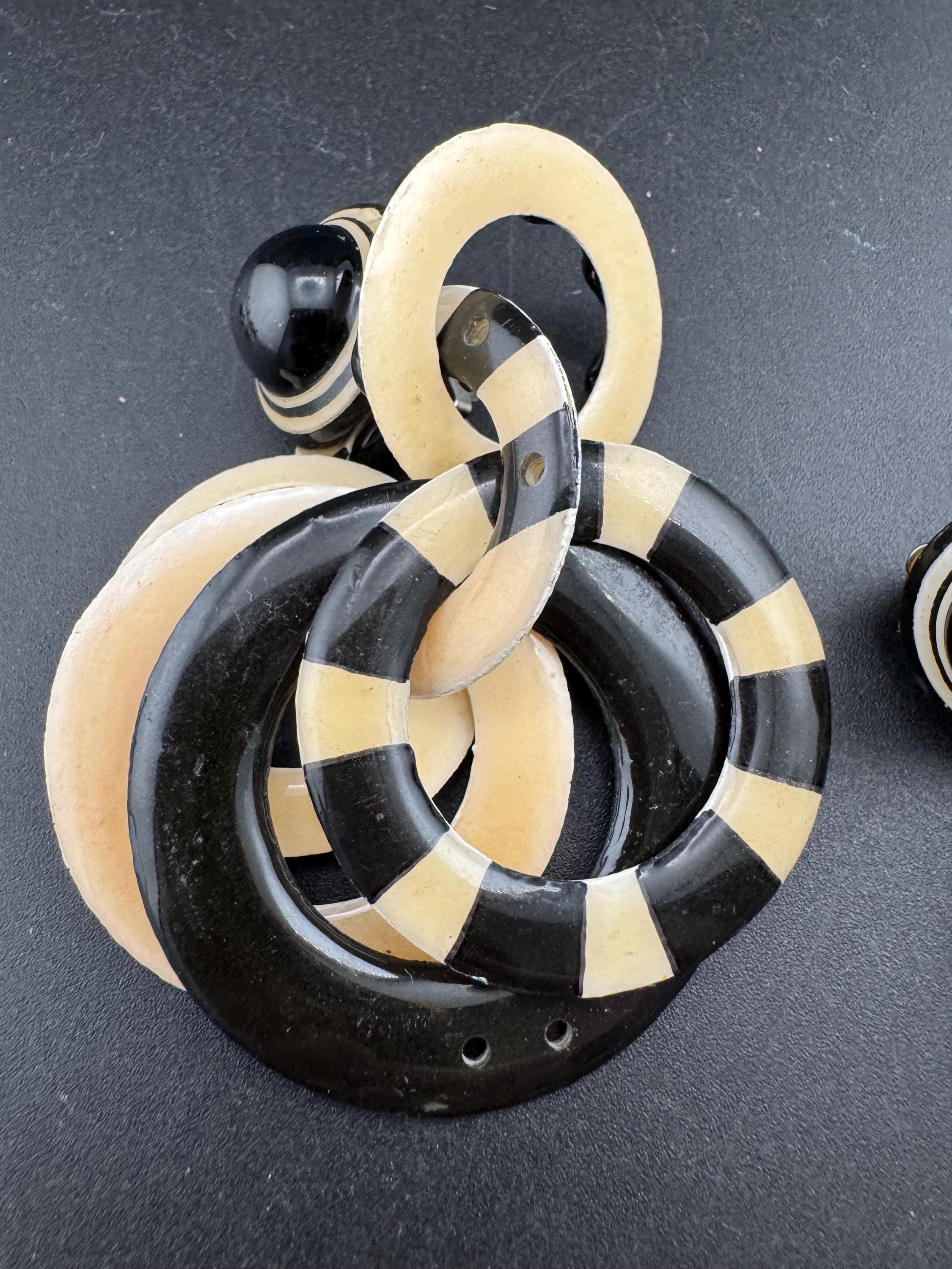 Vintage black and cream plastic hoops dangly drop clip on earrings, signed