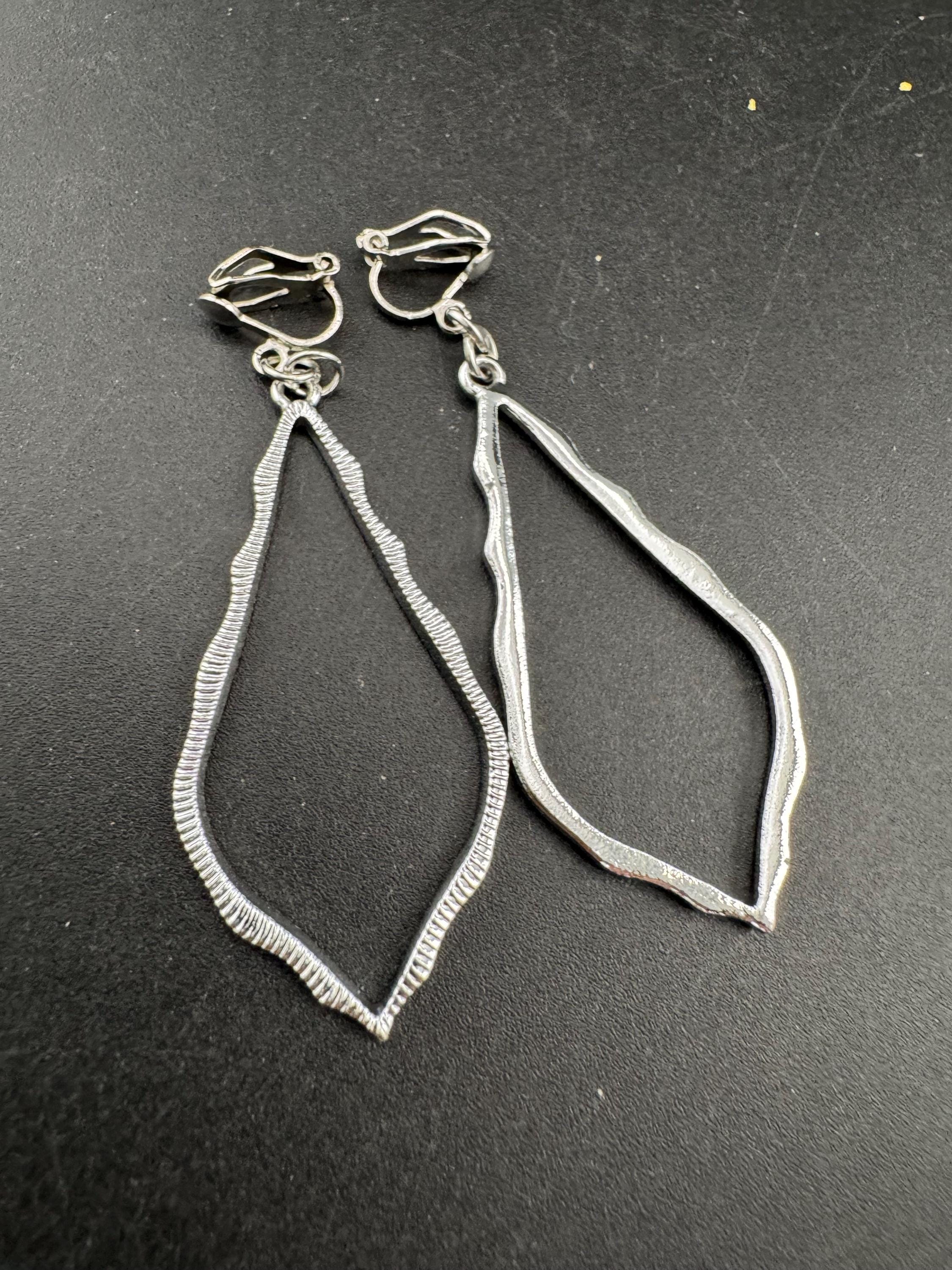 Retro modernist long dangly teardrop drop earrings, clip on silver tone