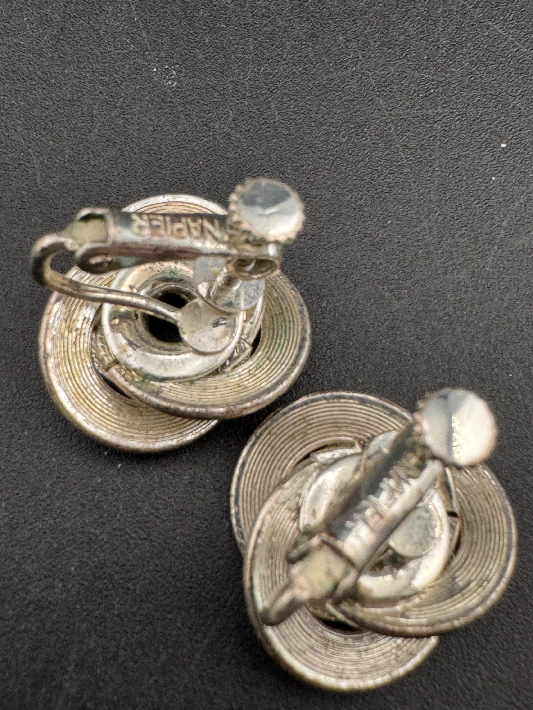 Signed NAPIER swirl knot clip on earrings, silver tone designer