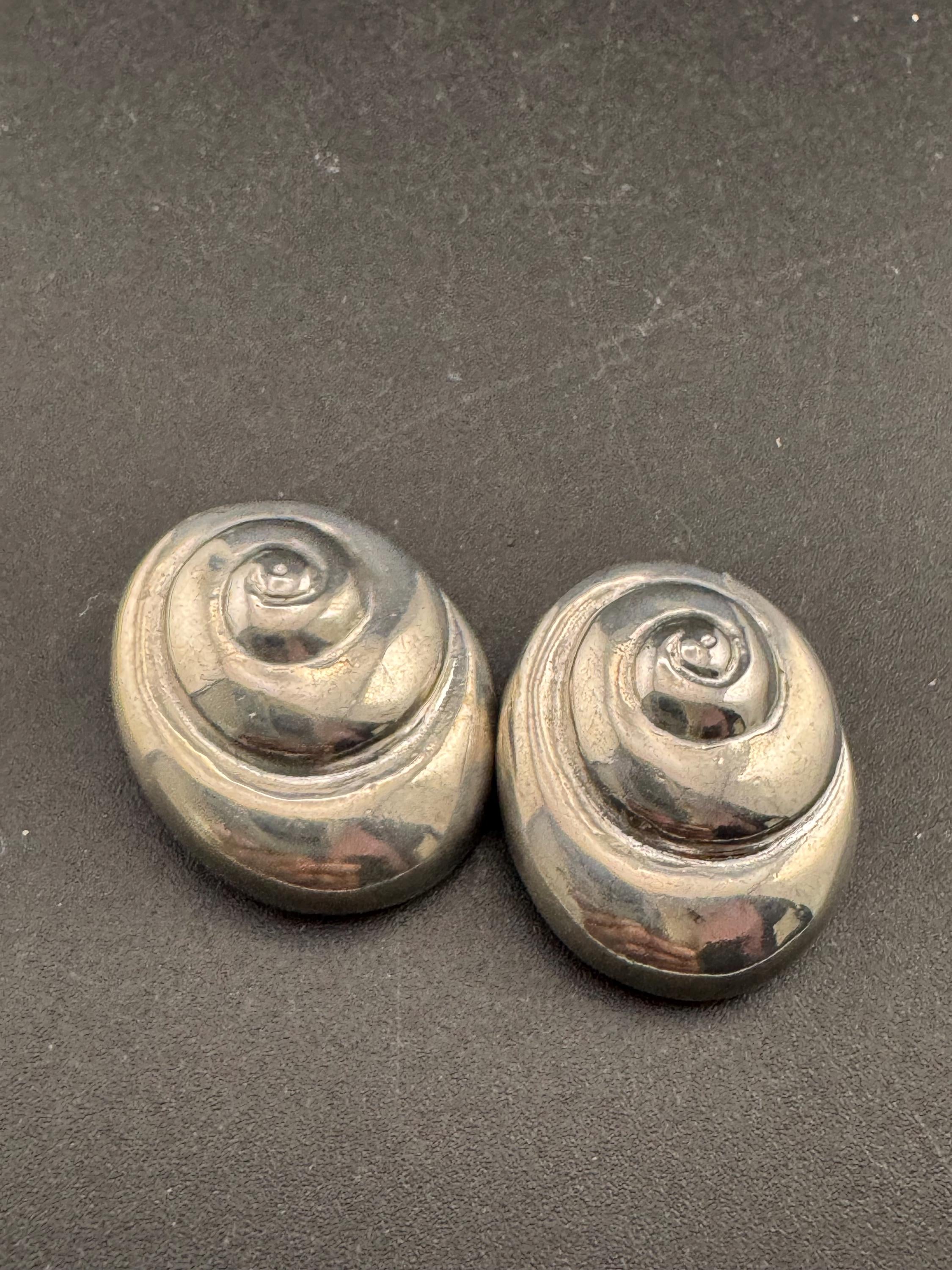Vintage swirl seashell clip on earrings, silver tone metal studs