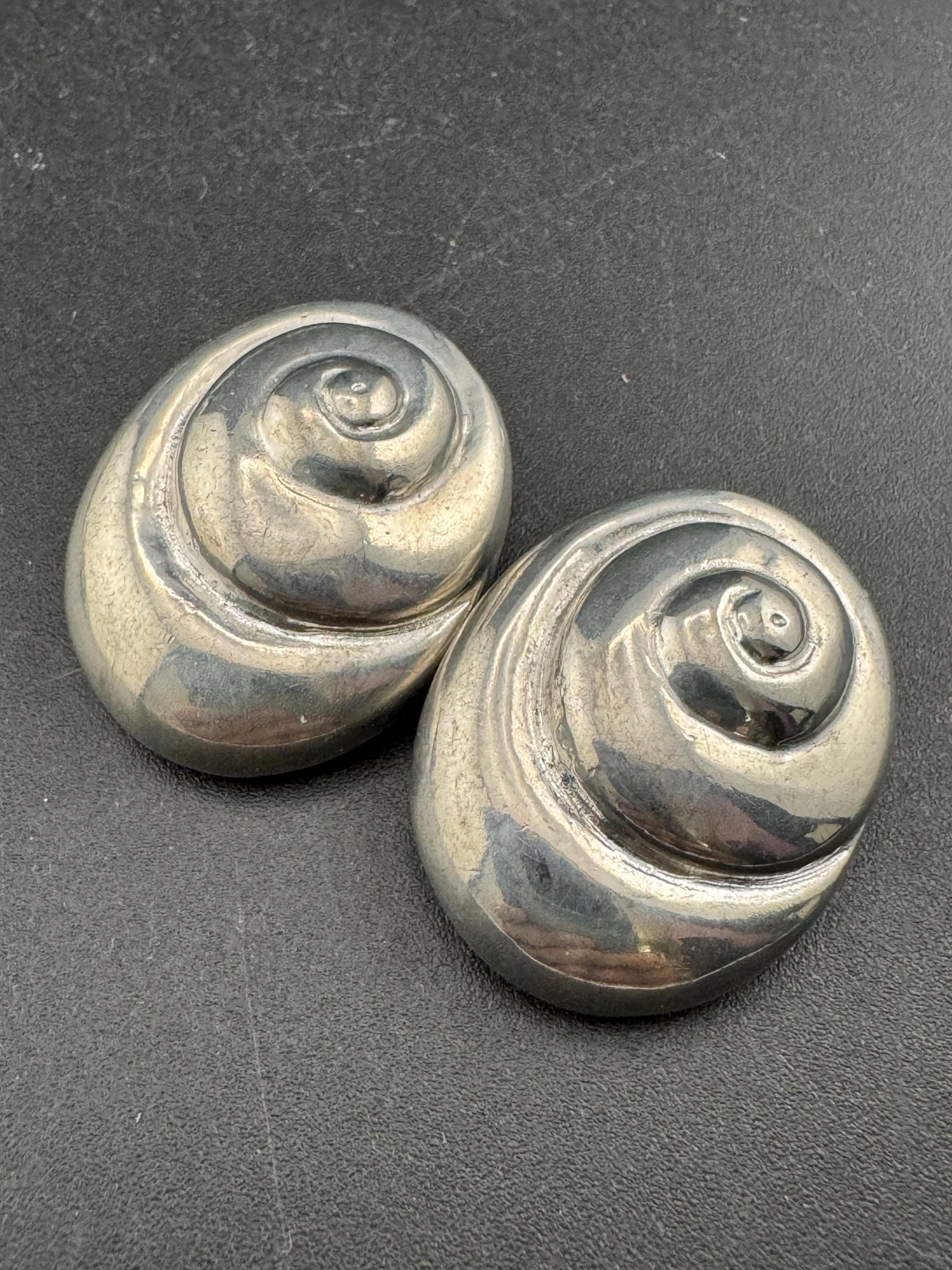 Vintage swirl seashell clip on earrings, silver tone metal studs