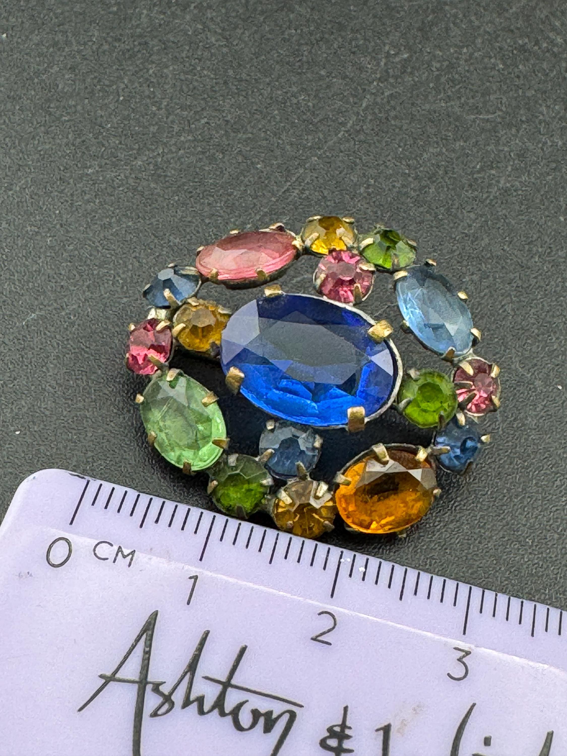 Antique Edwardian gold tone rainbow diamanté crystal oval open back brooch