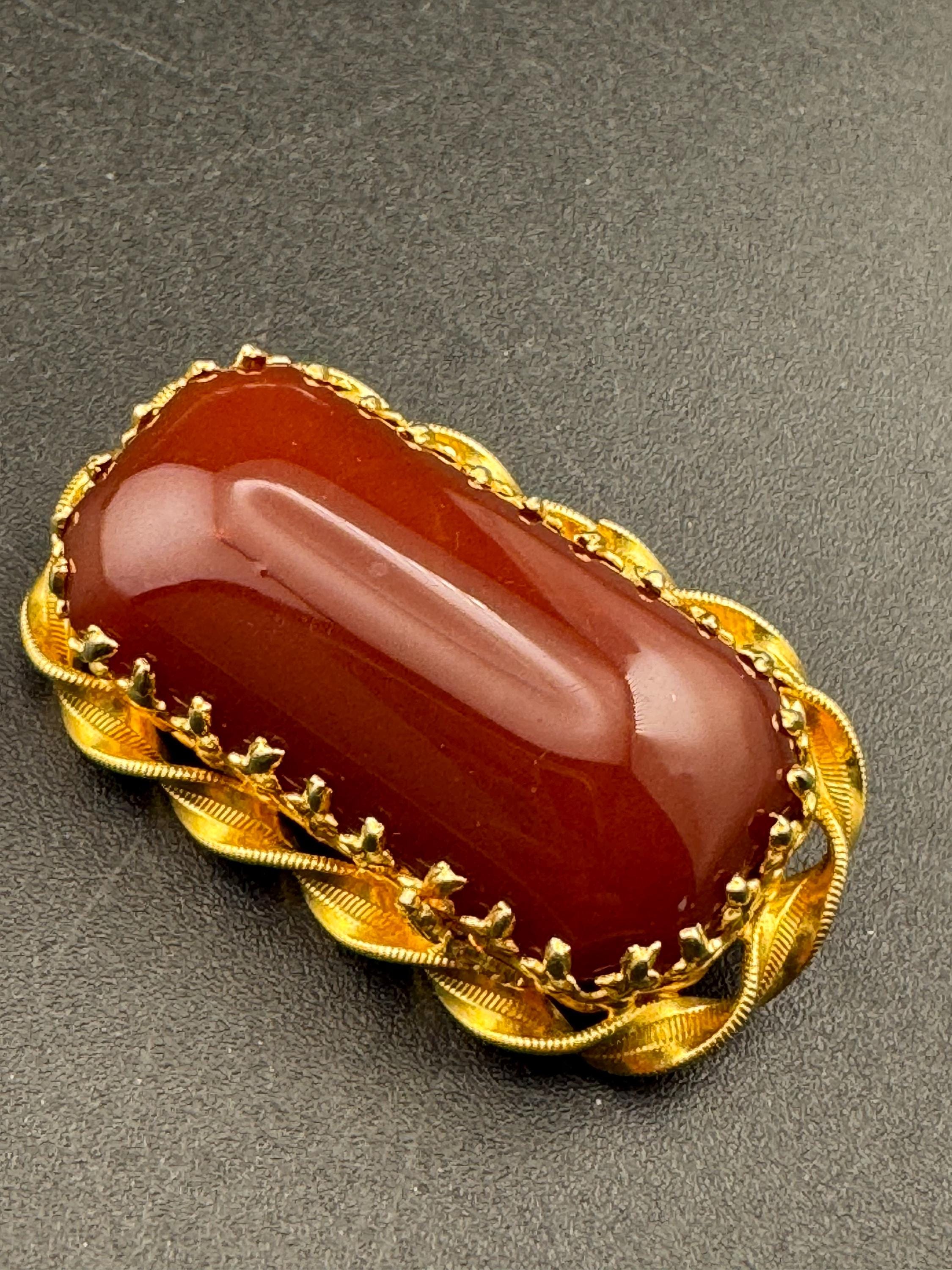 Signed Austria Red carnelian cabochon brooch, gold plated