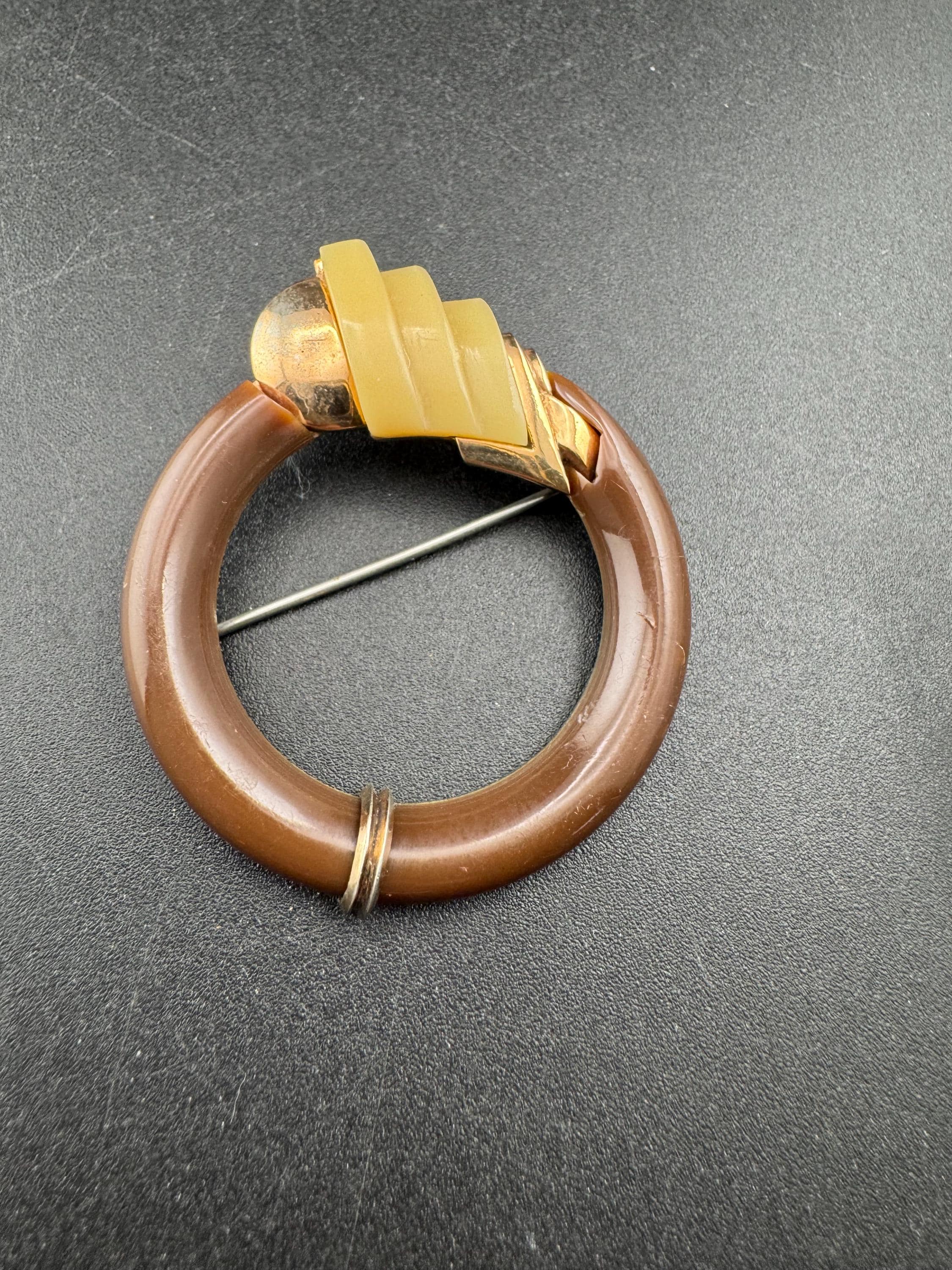 Vintage machine age brown enamel modernist brooch, galalith and chrome