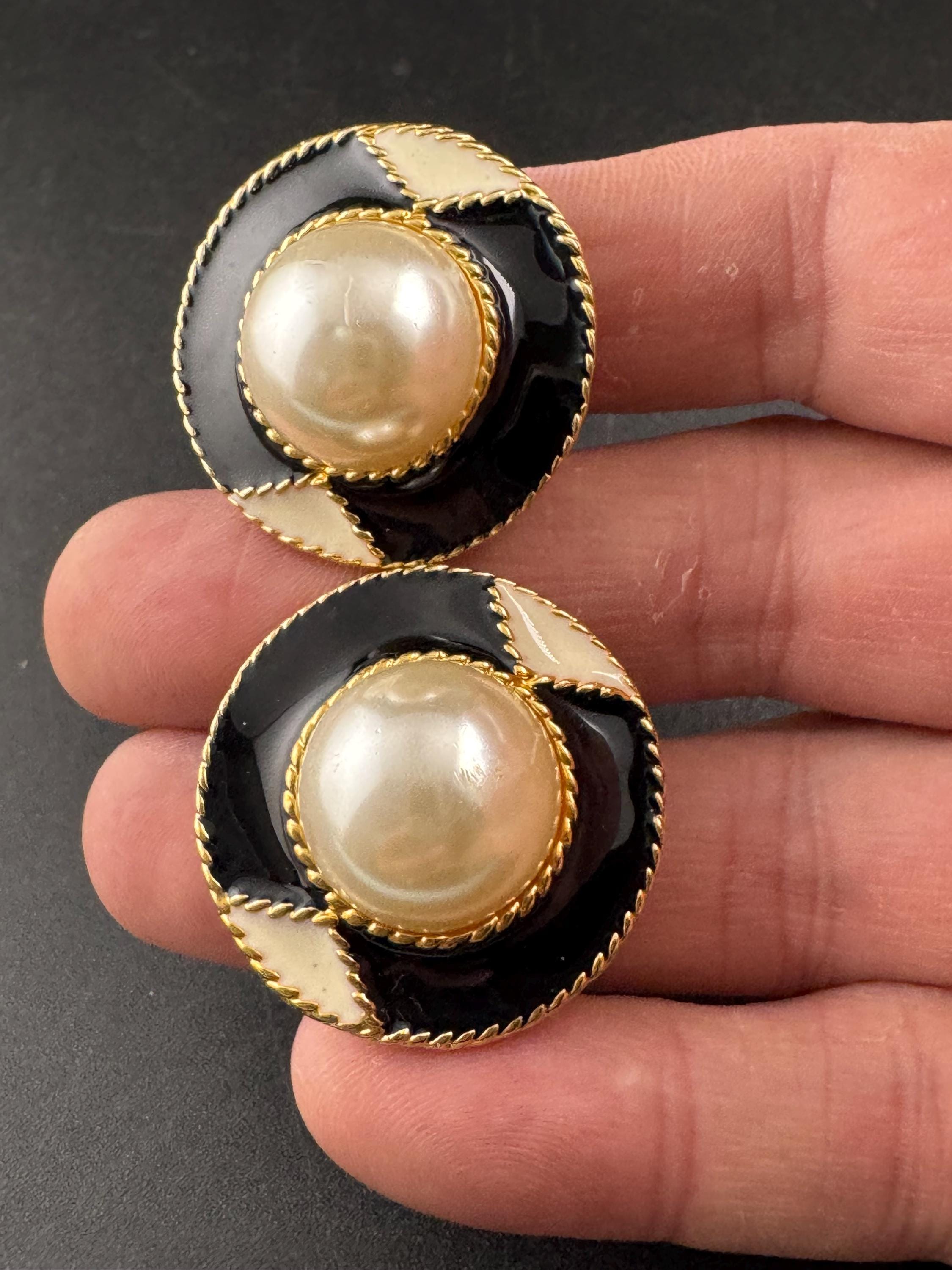 Vintage black and cream enamel and pearl oval clip on earrings , gold tone