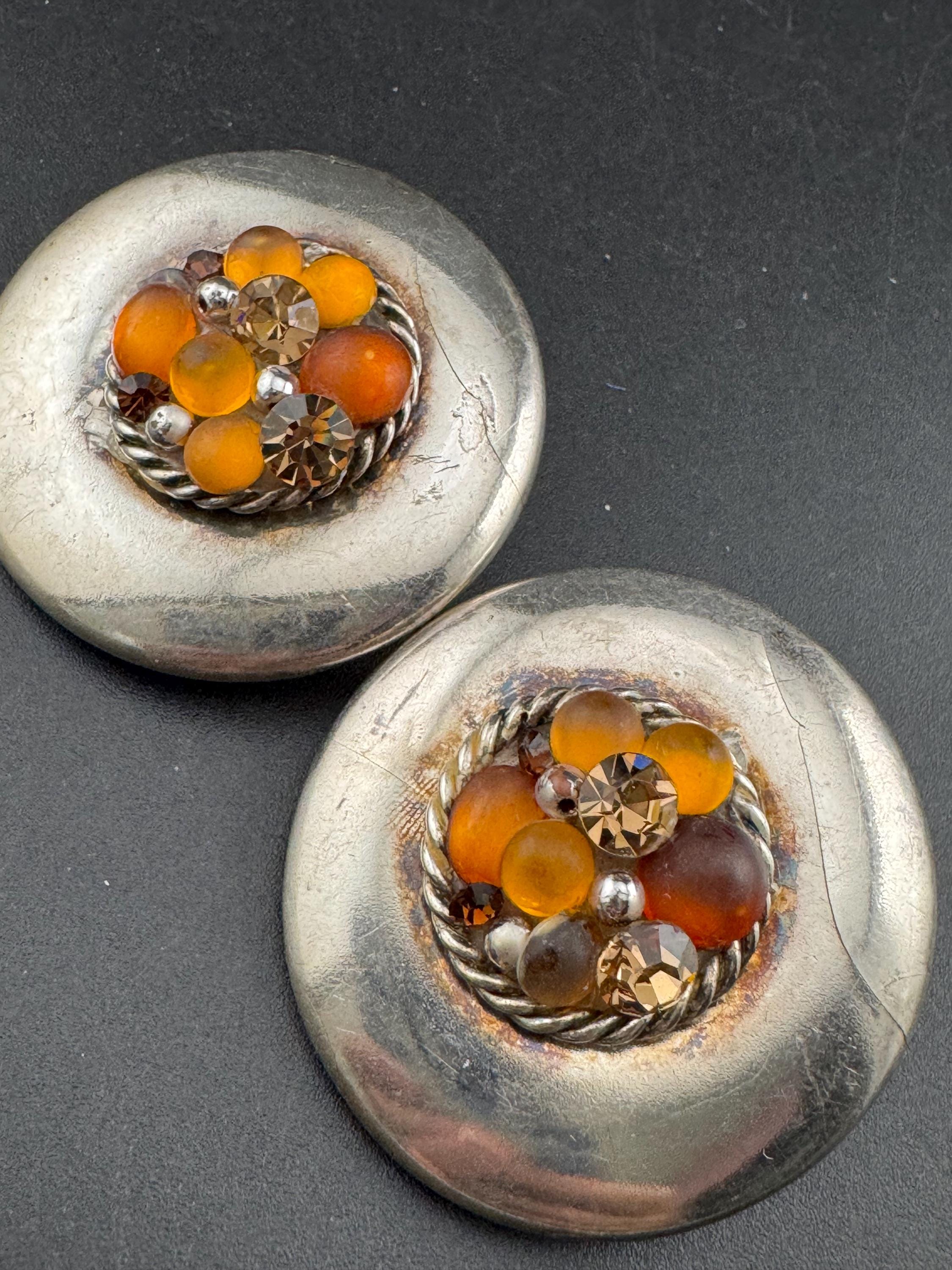 Jacky de G Oversized silver domed Clip On Earrings: designer orange stones