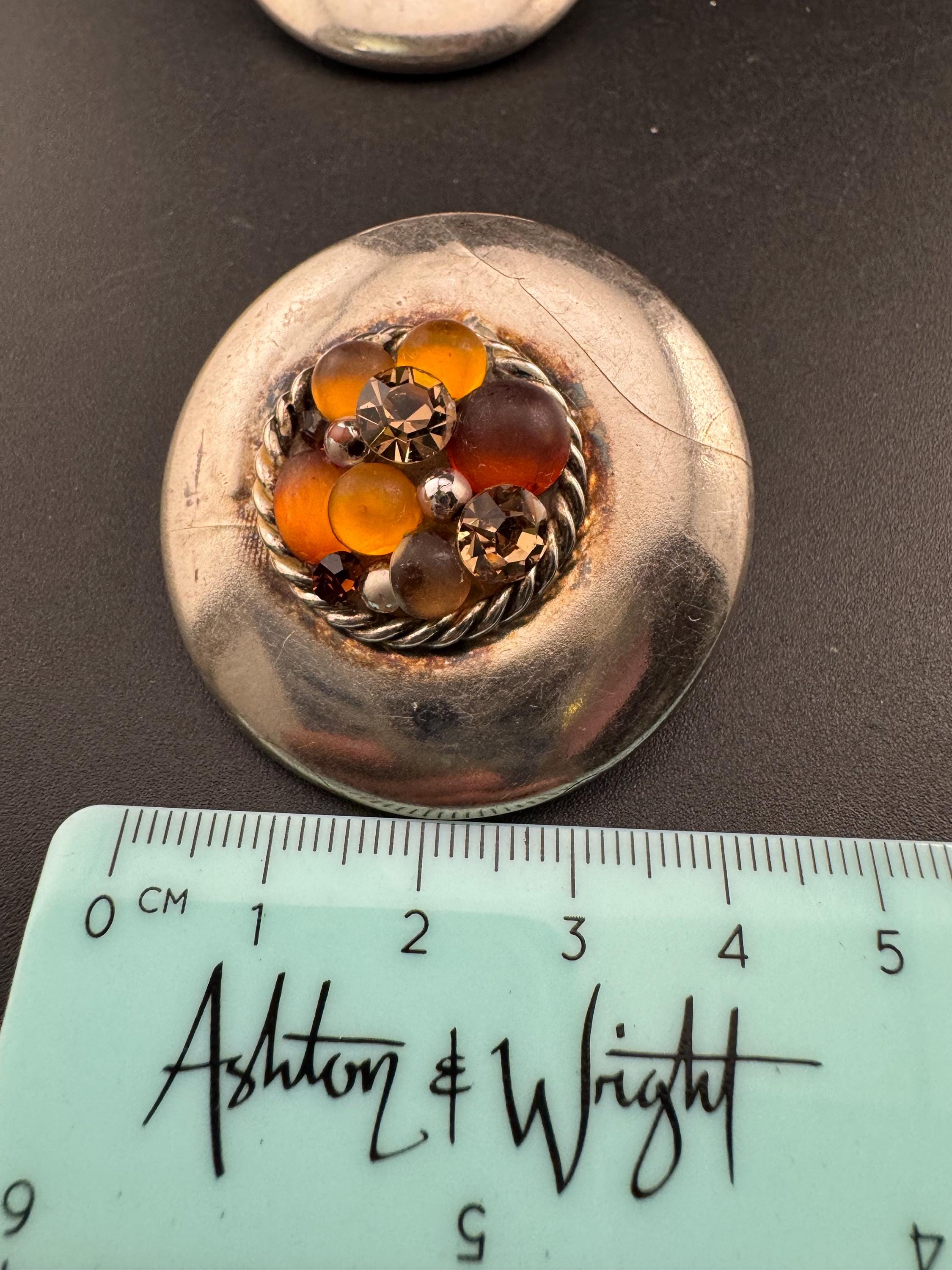 Jacky de G Oversized silver domed Clip On Earrings: designer orange stones