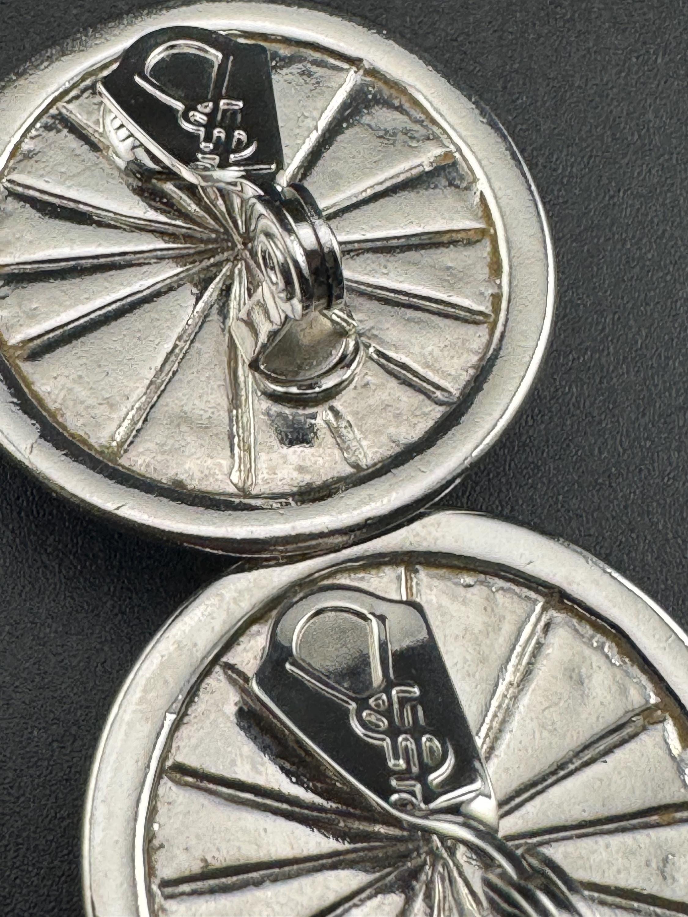 Signed YSL grey domed Clip On Earrings: 4cm silver by yves Saint Laurent