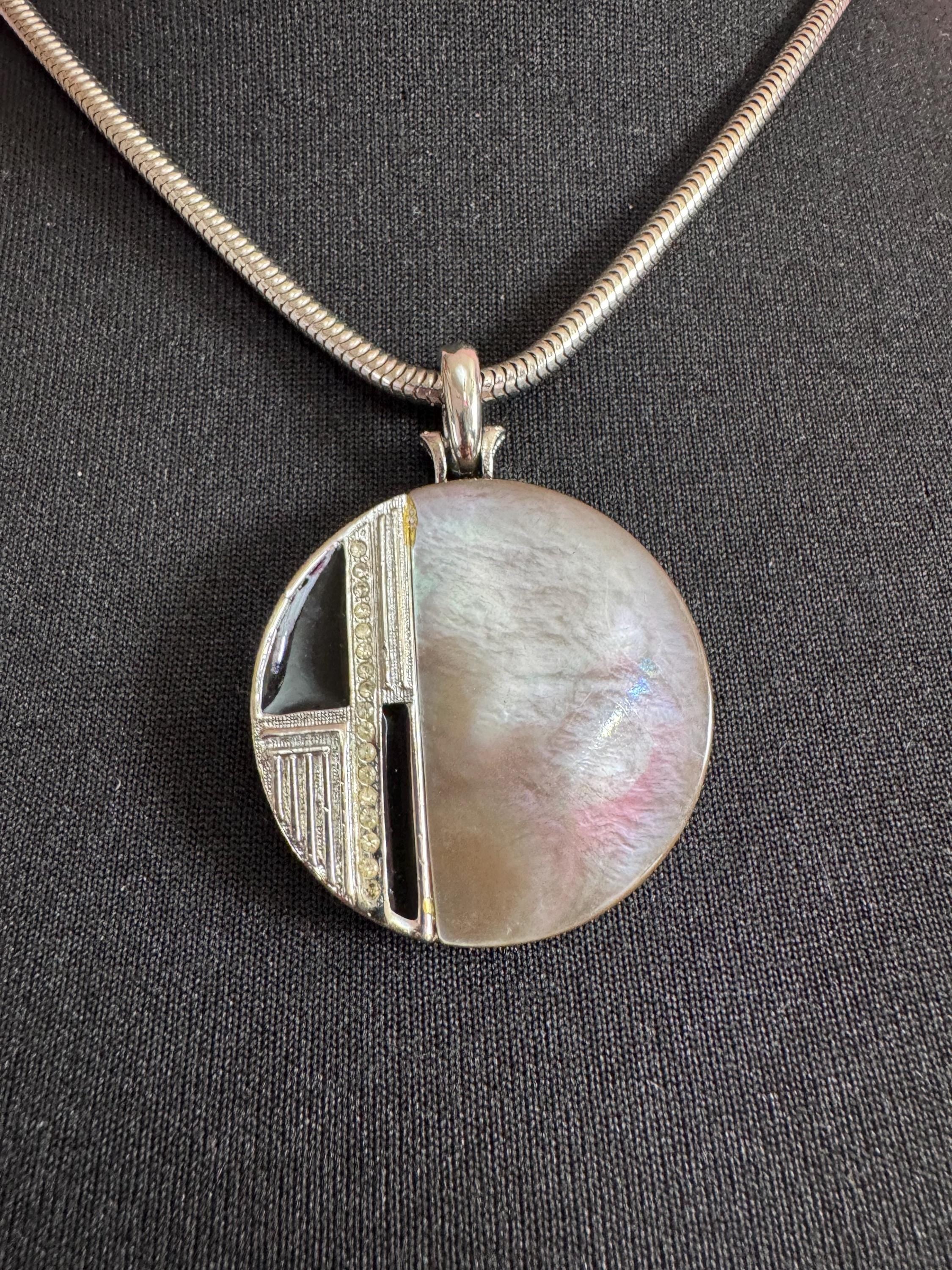 Signed MANDLE black enamel mother of pearl disc pendant on a snake chain necklace