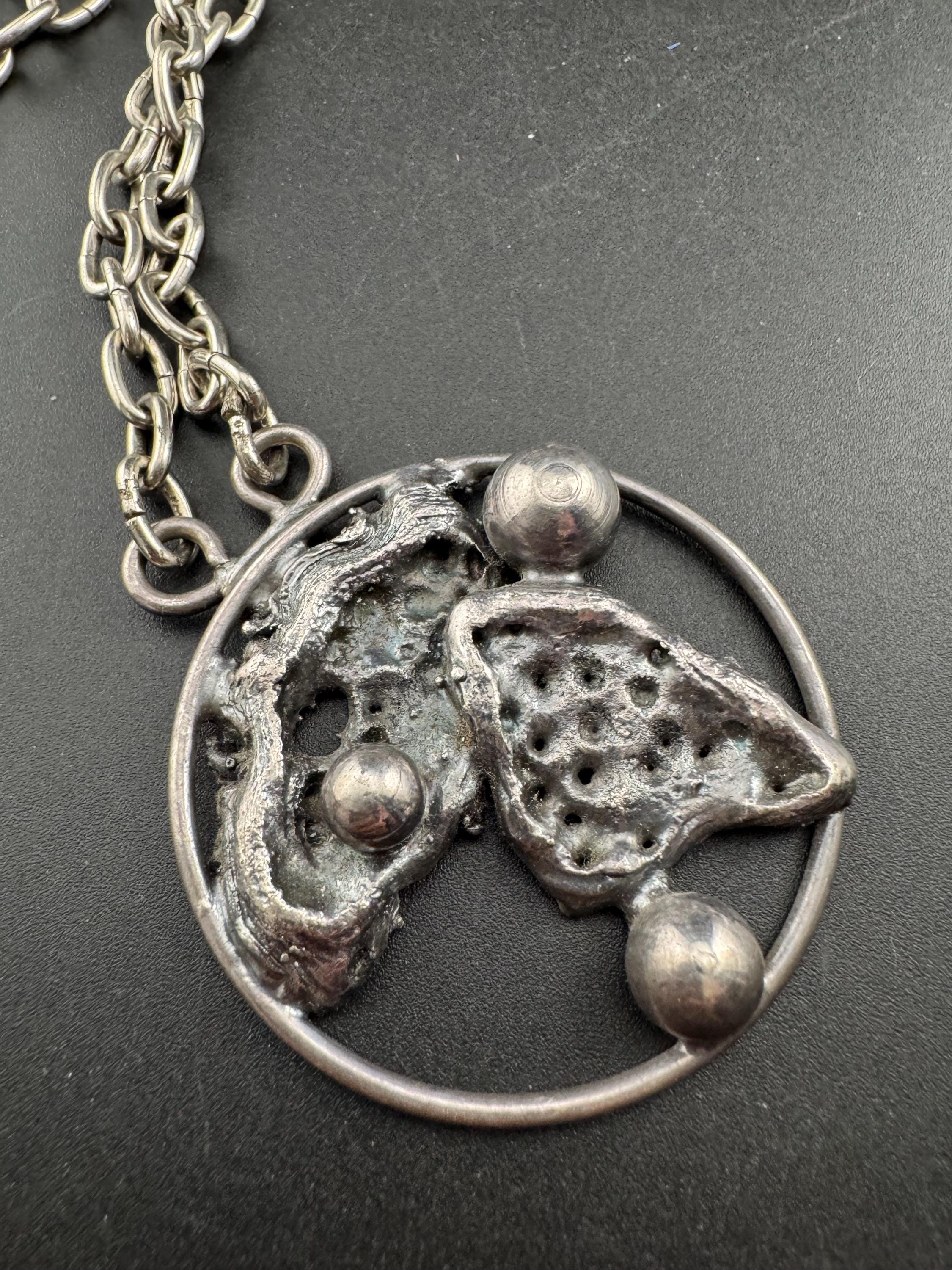 J hull danish brutalist medallion  pendant on a 88cm chain