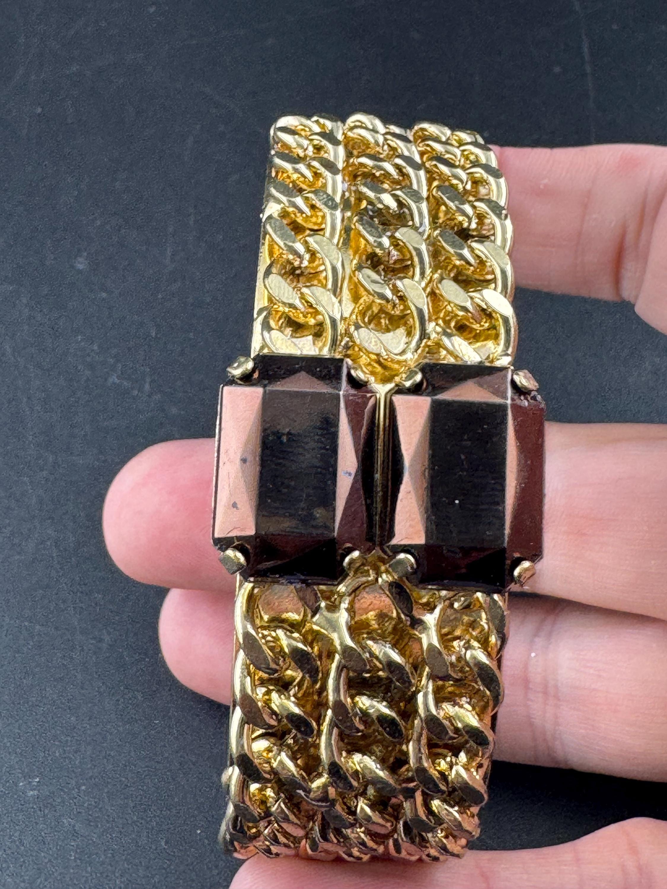 Wide curb chain link bangle with brown acrylic rhinestones, gold tone cuff bracelet