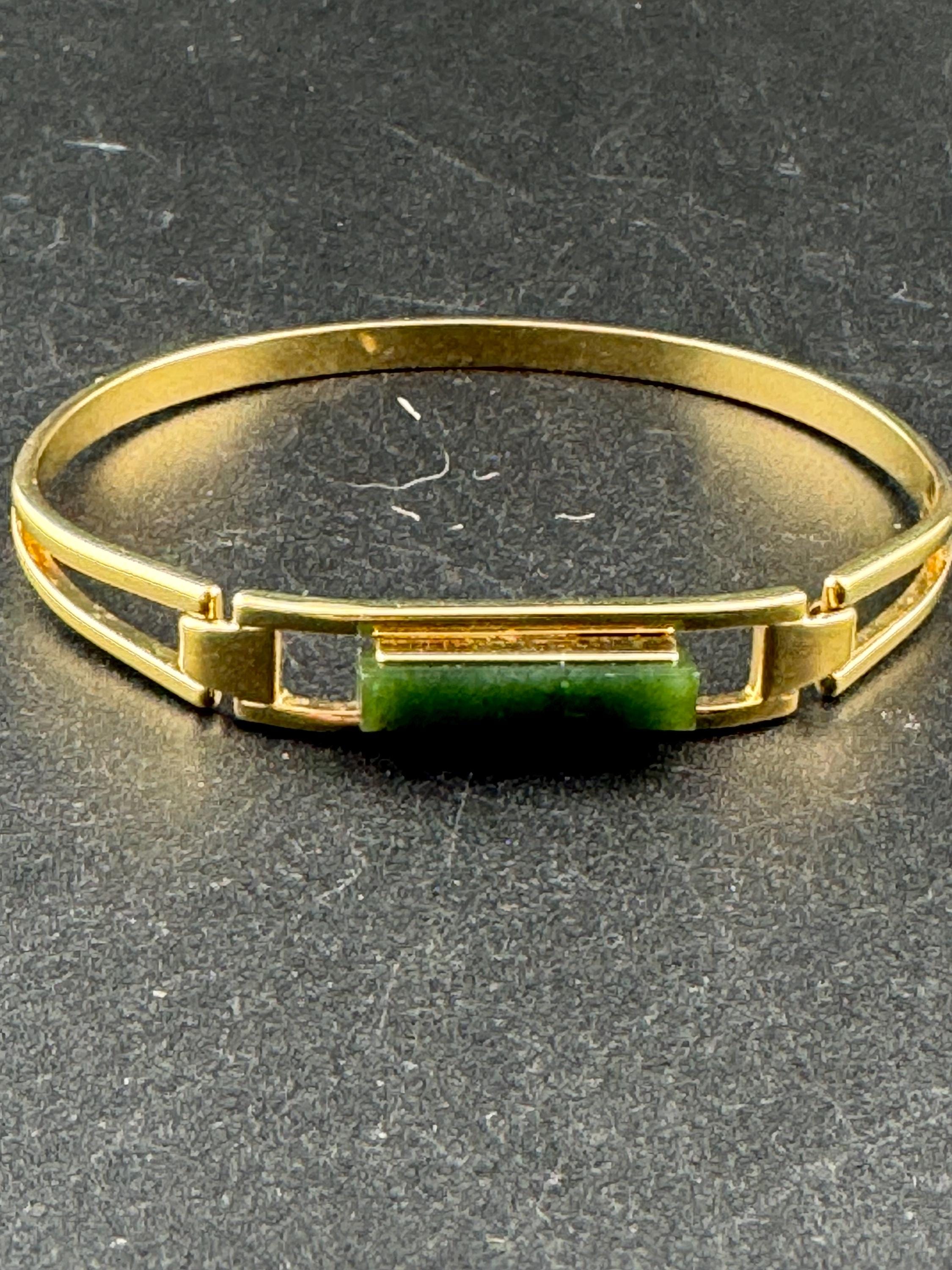 Vintage signed Avon gold tone green jade glass hinged bangle