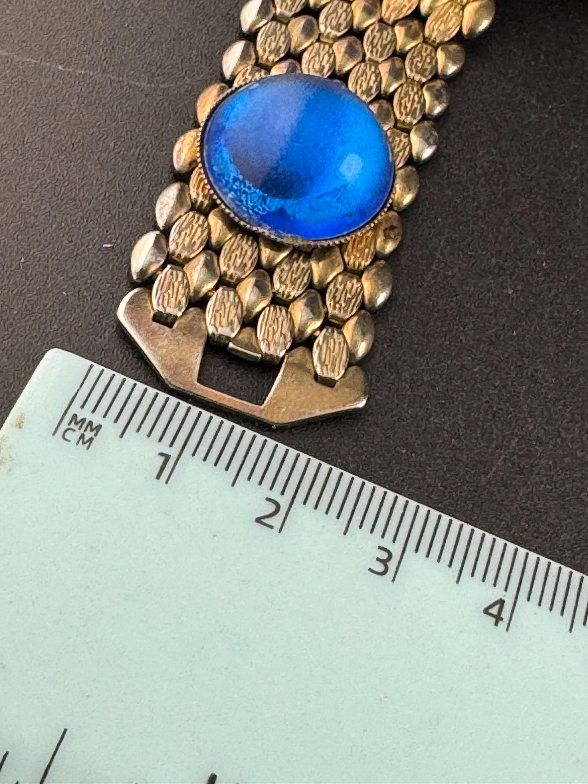 Red green blue purple cabochon gold tone wide panther link chain bracelet