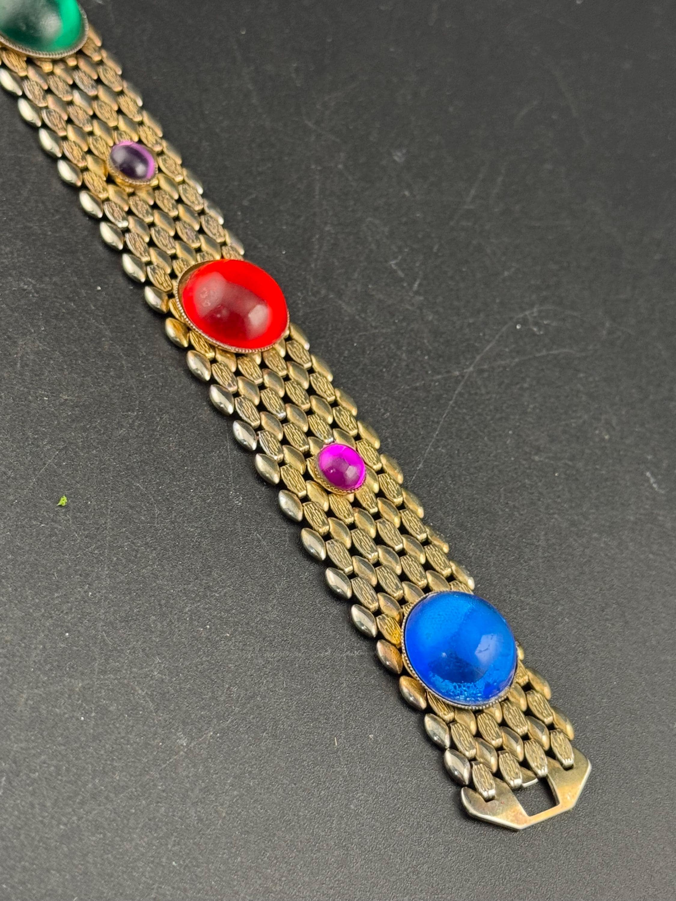 Red green blue purple cabochon gold tone wide panther link chain bracelet