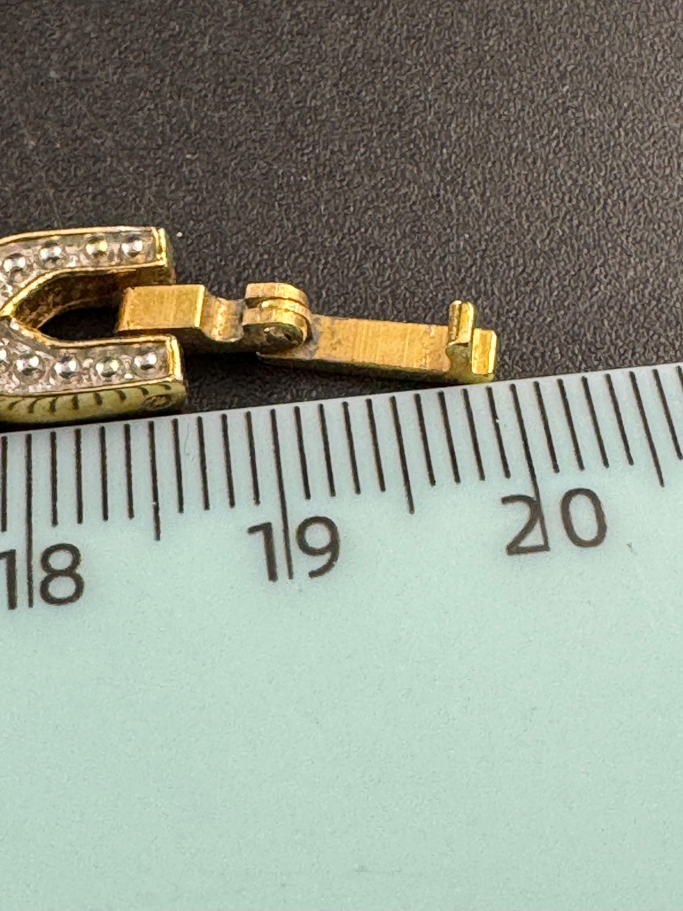 retro gold tone XO faux amethyst cabochon bracelet 19cm