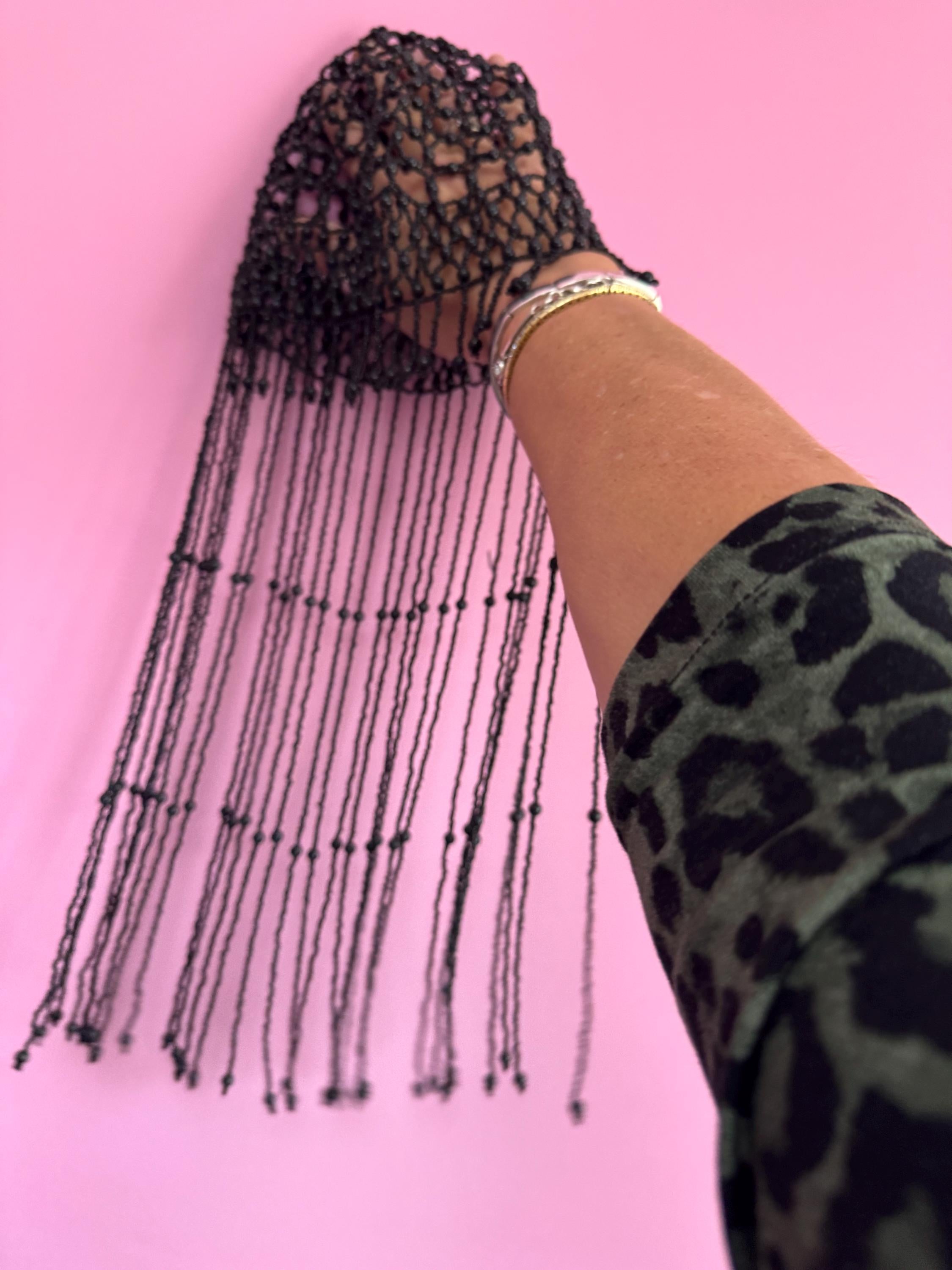 Quirky black head piece bead cloche headress